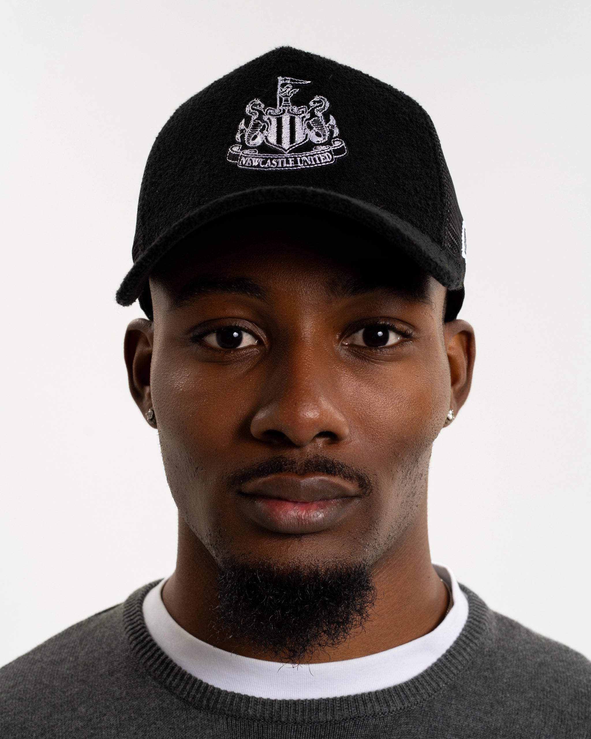 Newcastle United New Era Black Terry Cloth E-Frame Trucker Adjustable Cap
