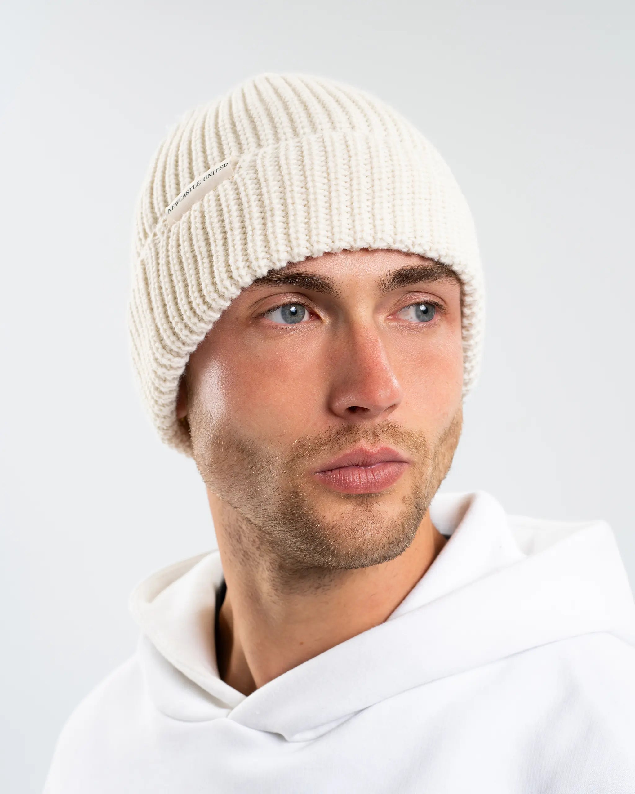 Newcastle United New Era Beige Woven Label Beanie
