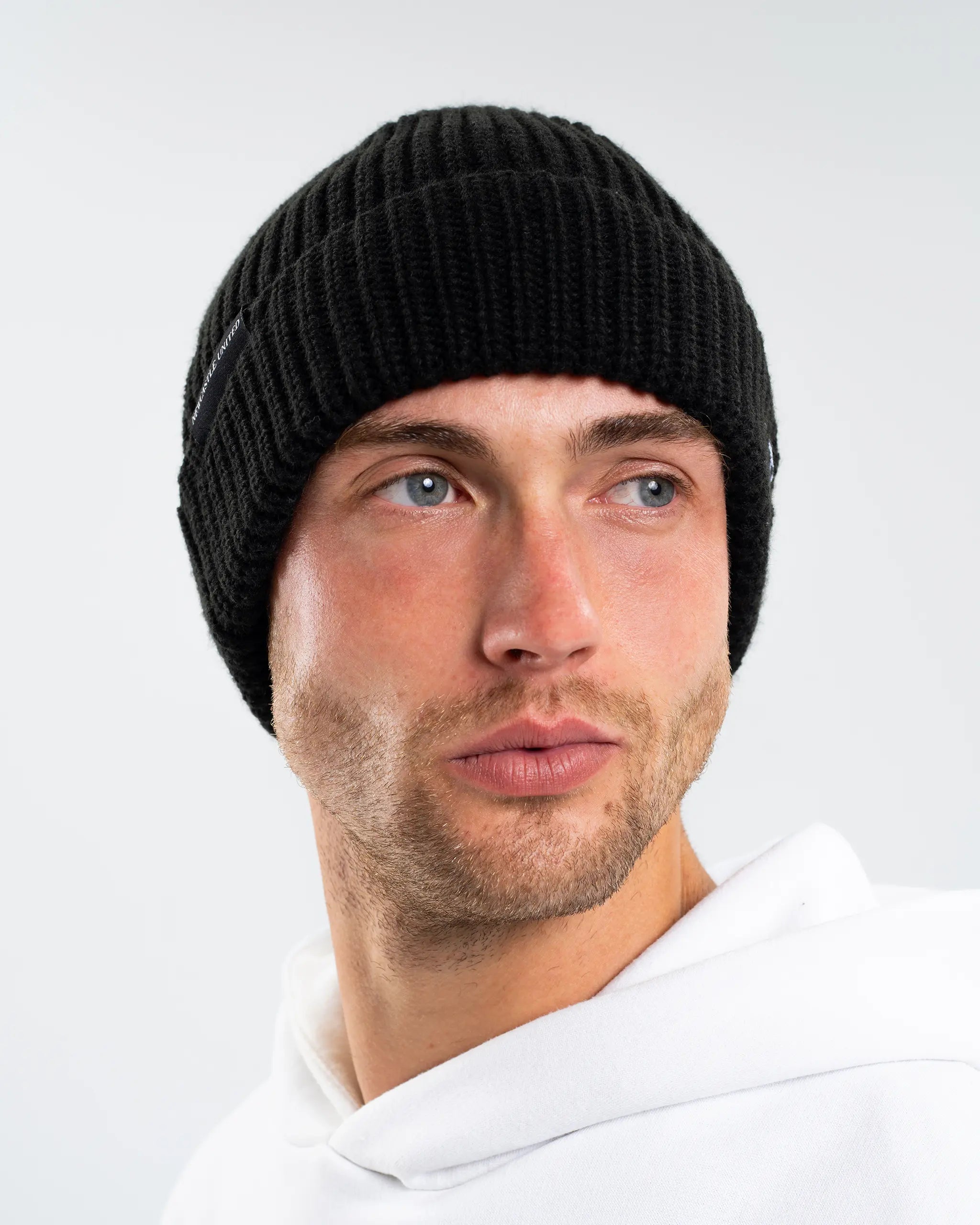 Newcastle United New Era Black Woven Label Beanie