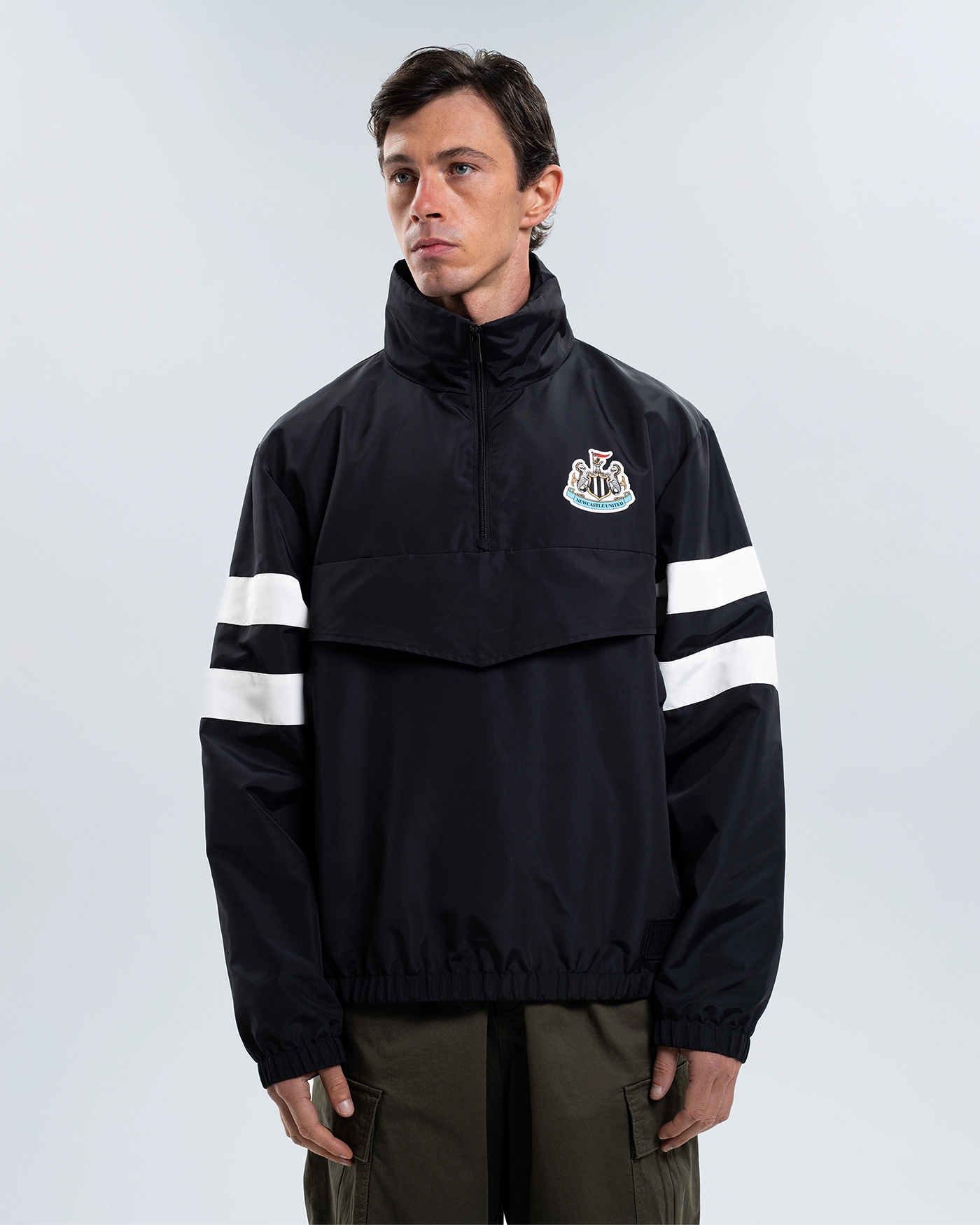Newcastle United Black Quarter Zip Cagoule