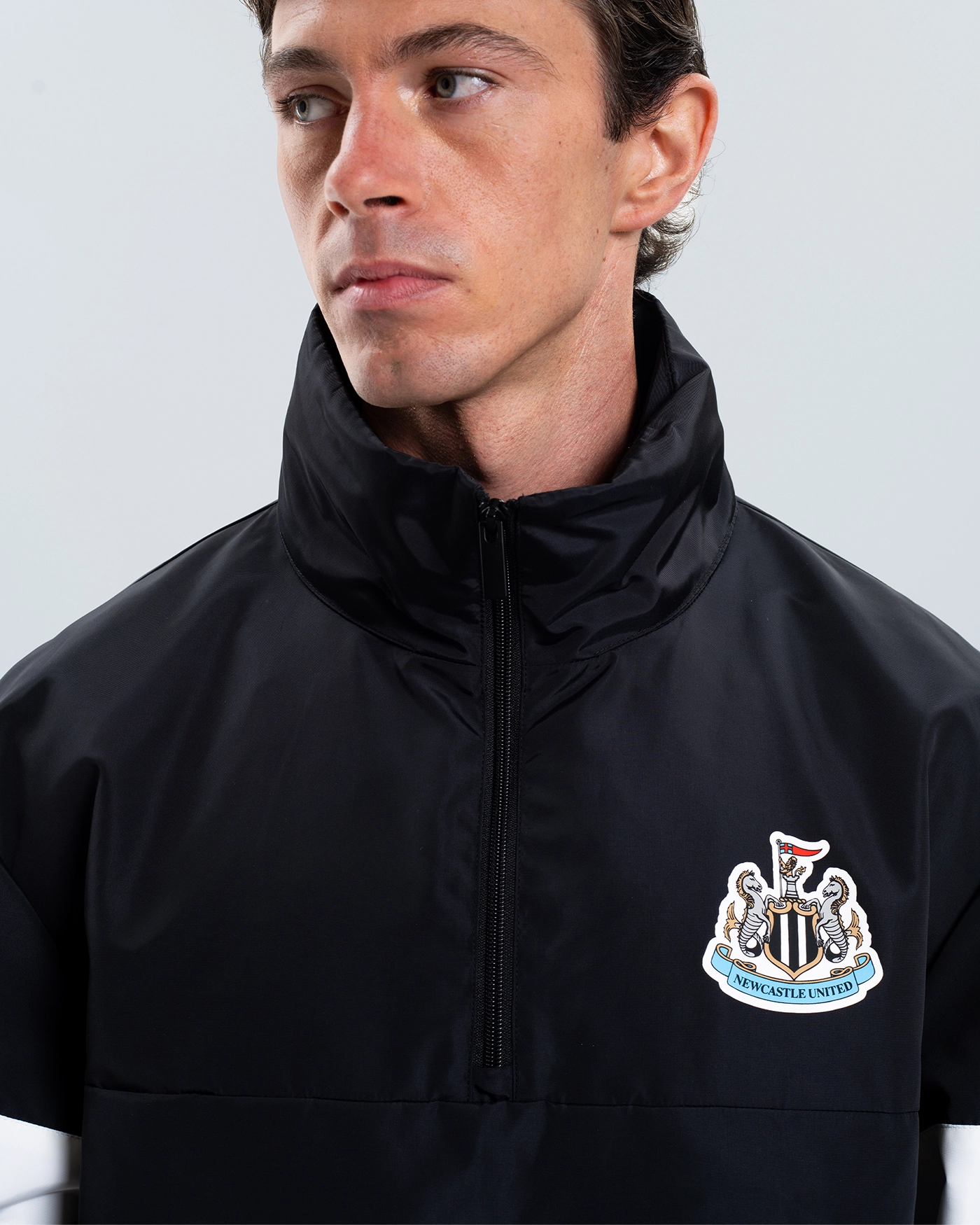 Newcastle United Black Quarter Zip Cagoule