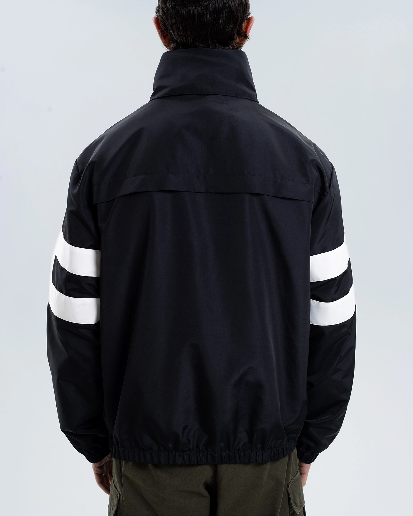 Newcastle United Black Quarter Zip Cagoule