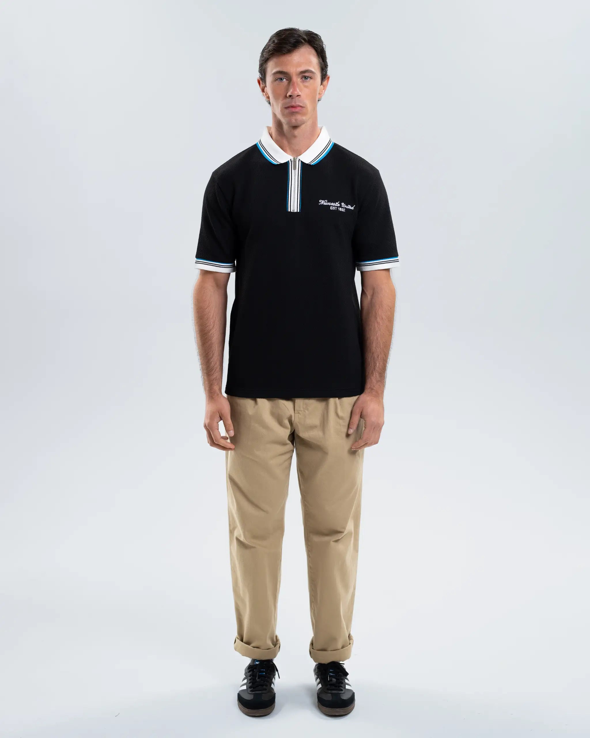 Newcastle United Men's Zipped Black Polo Shirt