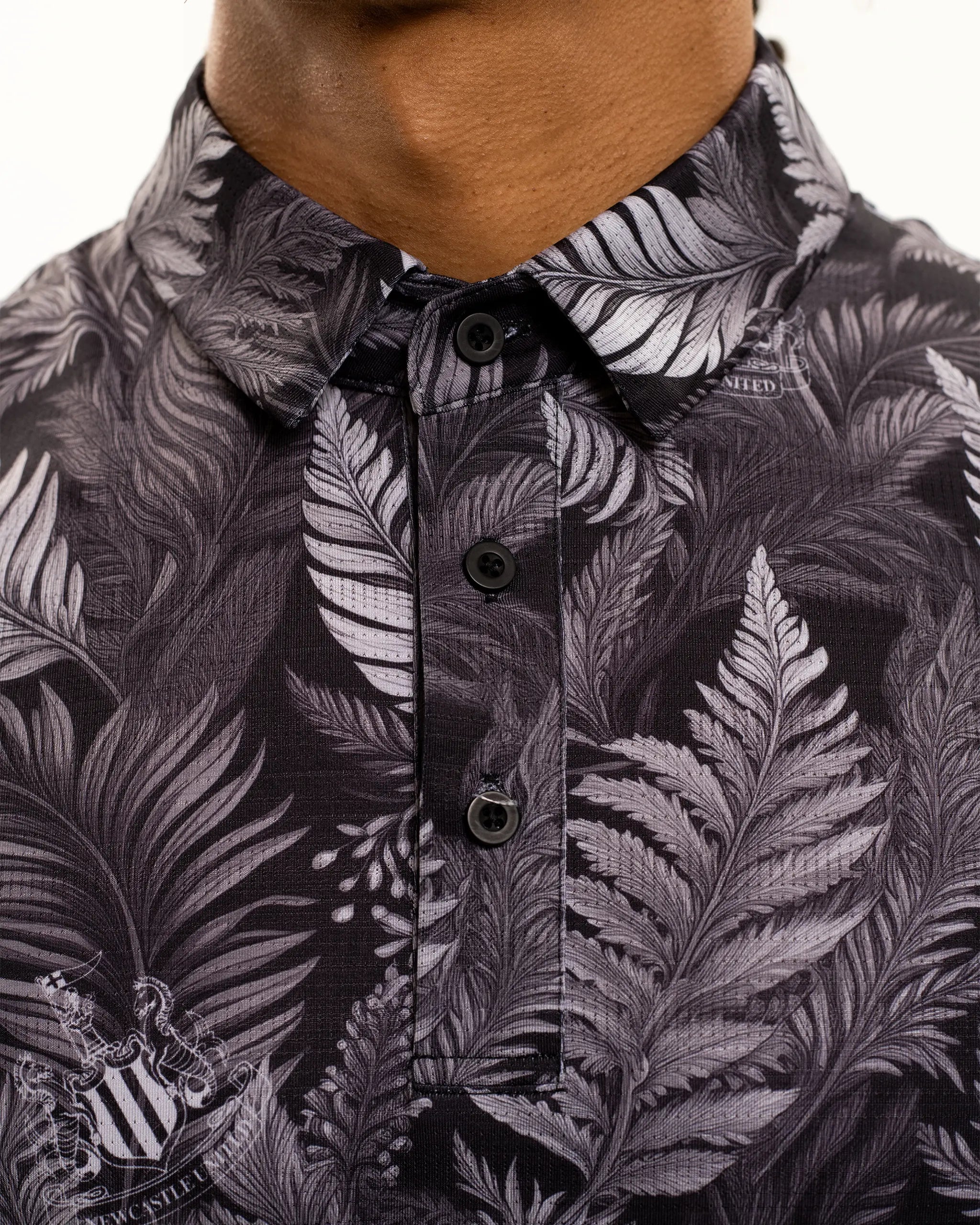 Newcastle United Men's Black Feather Polo Shirt
