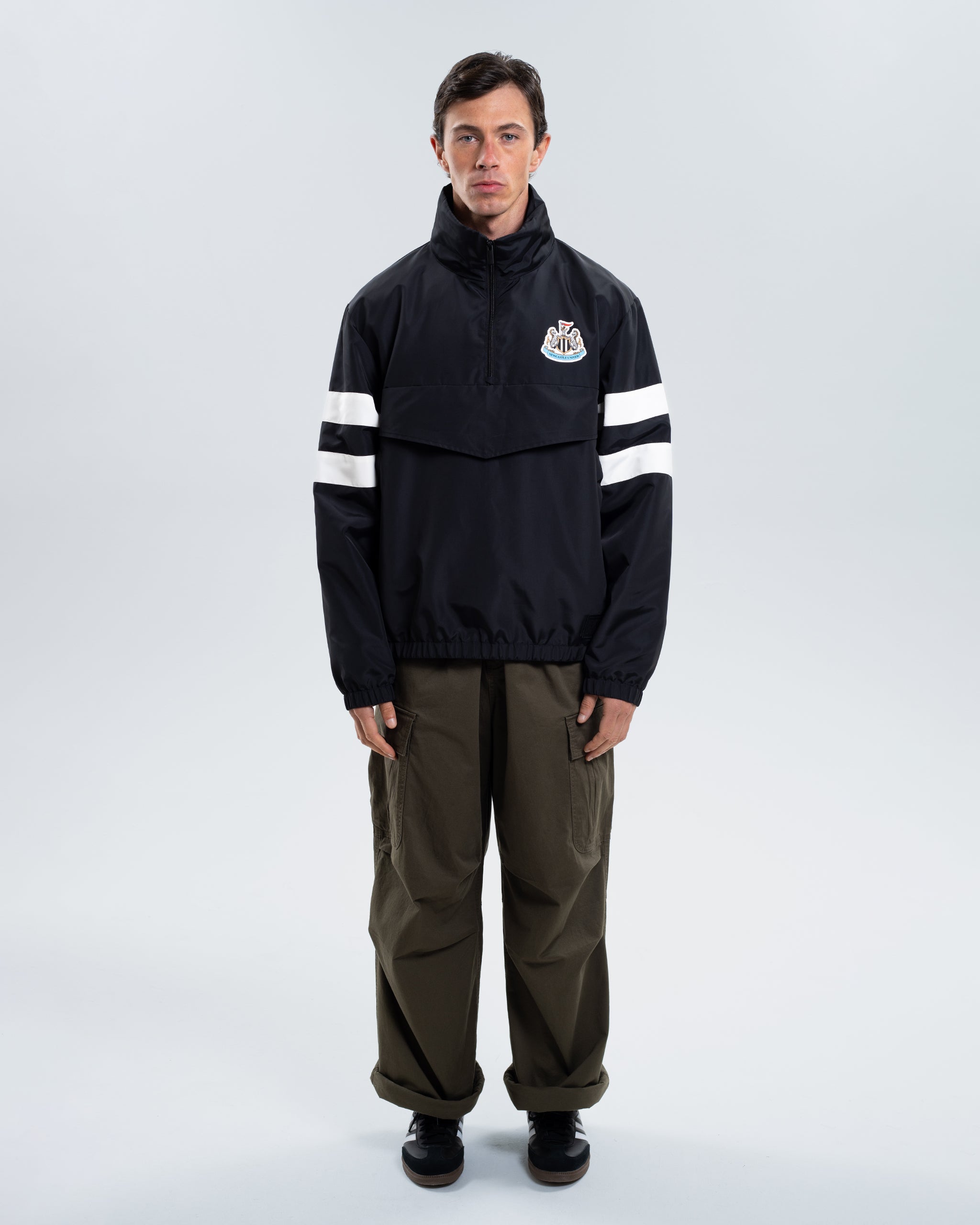 Newcastle United Black Quarter Zip Cagoule