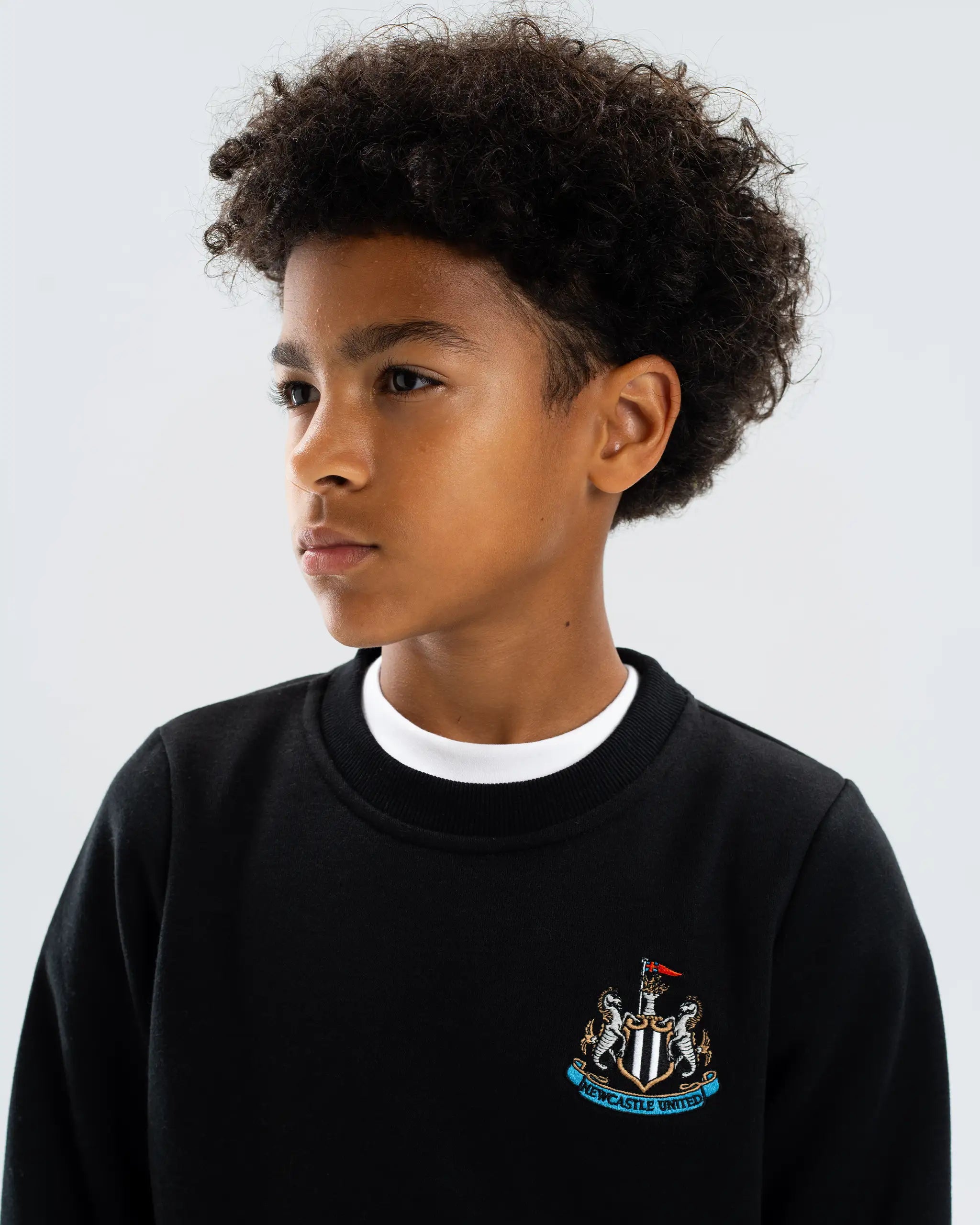 Newcastle United Kids' Essentials Range Black Crew Neck Sweater