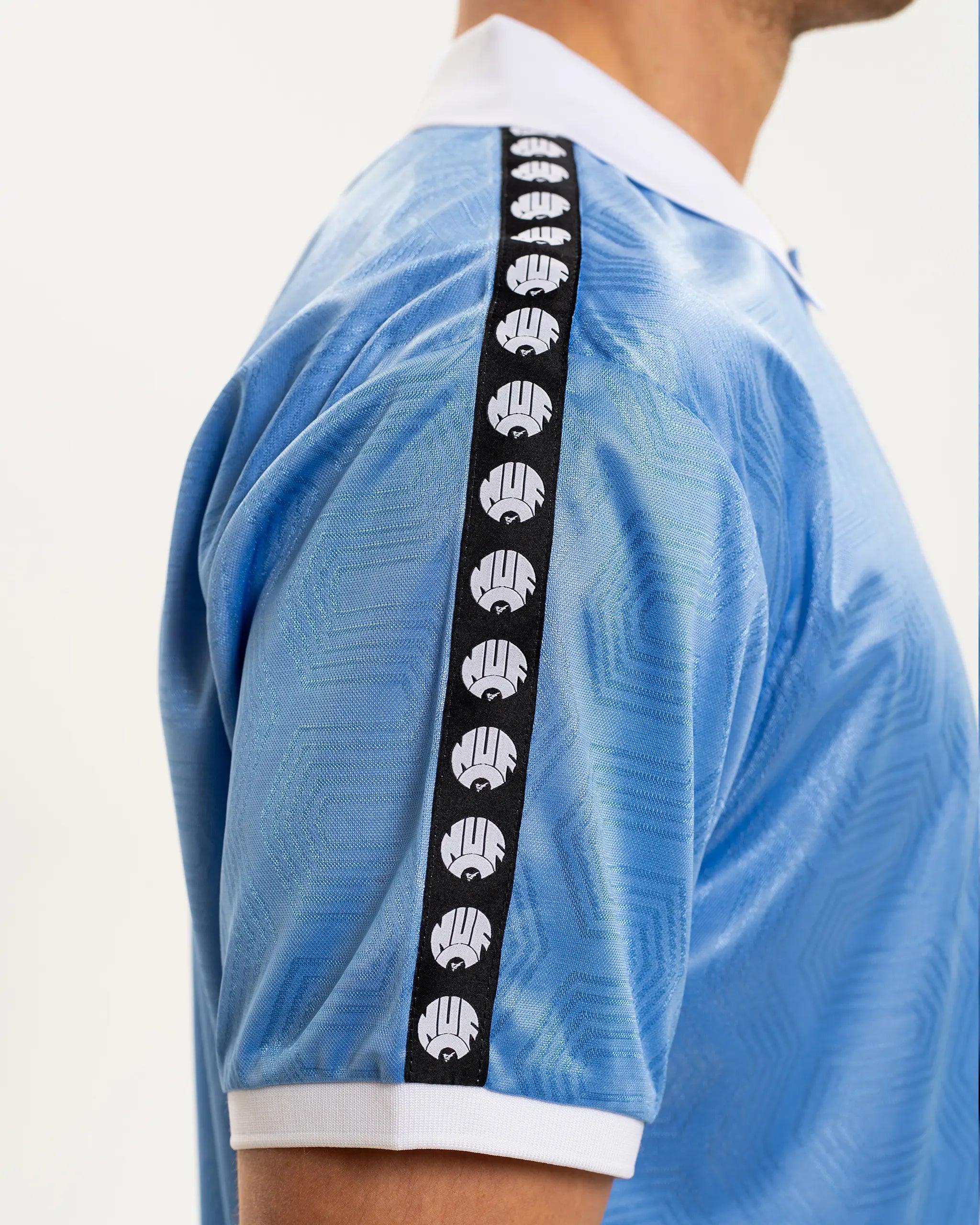 Newcastle United Men's Light Blue Tape Polo Shirt