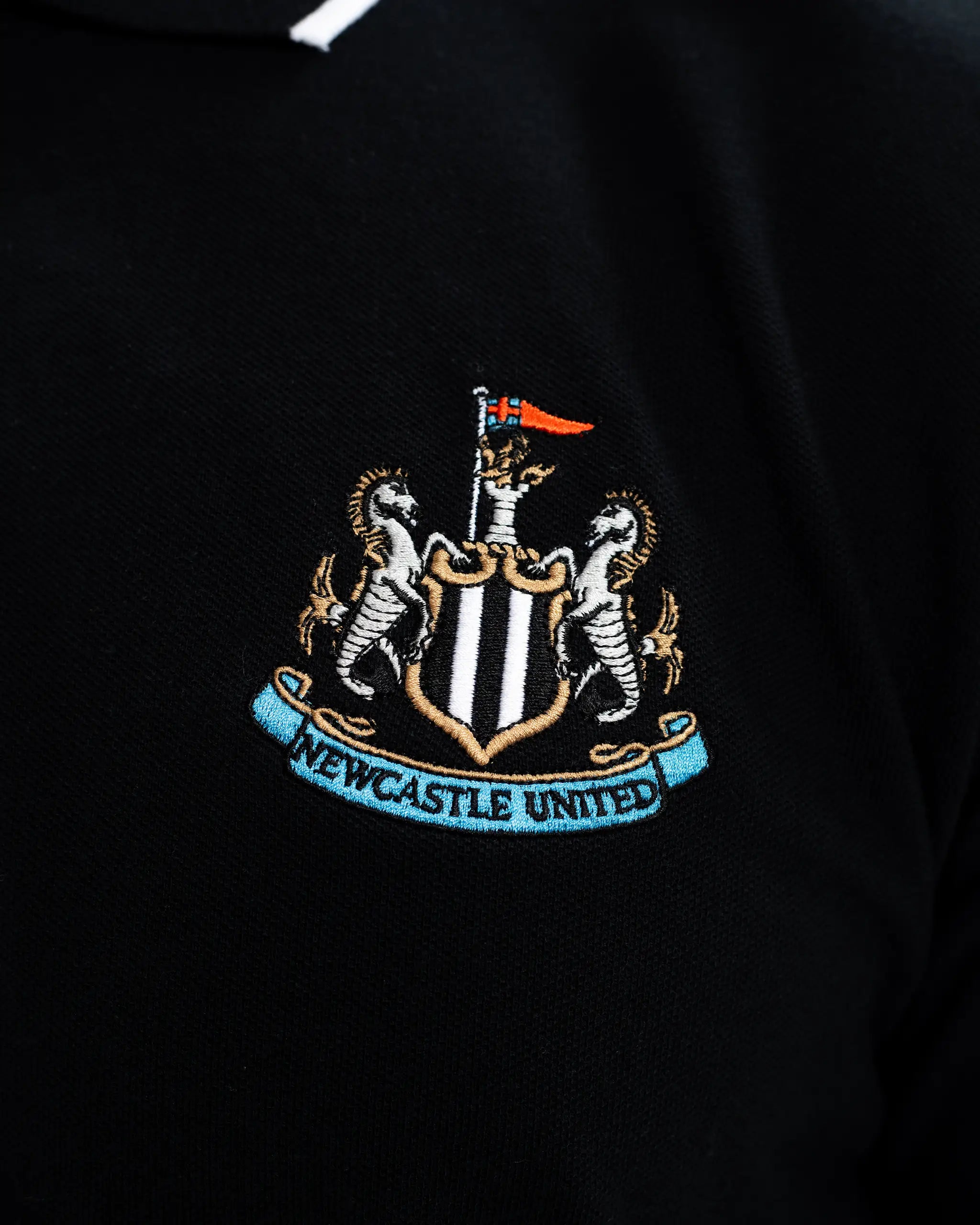 Newcastle United Men's Essentials Range Black Polo Shirt