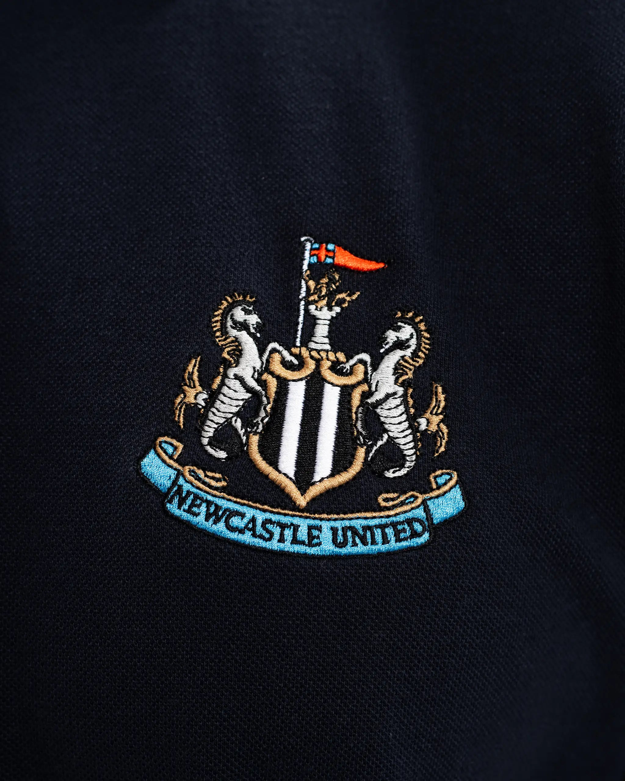 Newcastle United Men's Essentials Range Navy Polo Shirt