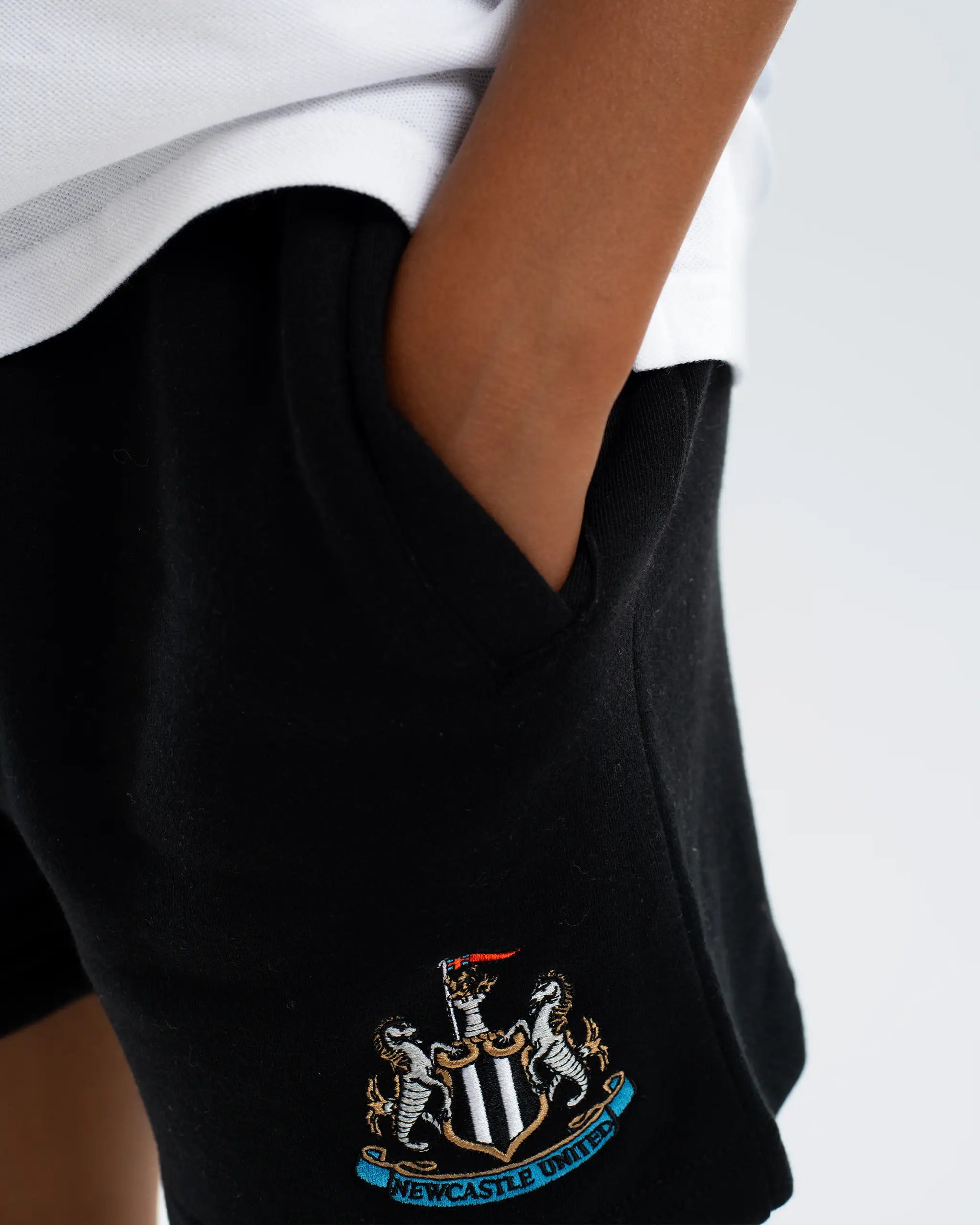 Newcastle United Kids' Essentials Range Black Fleece Shorts