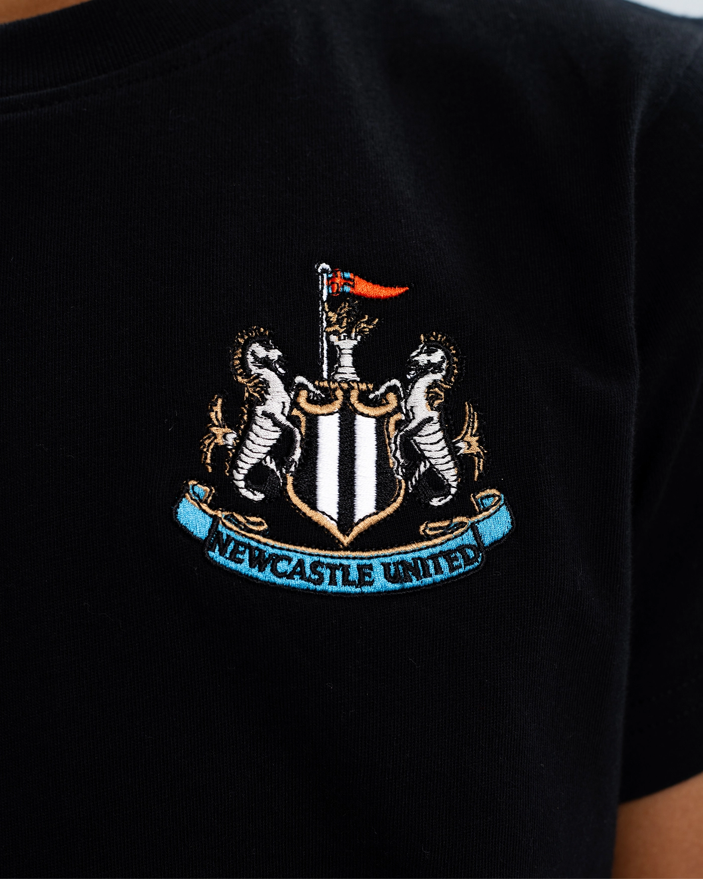 Newcastle United Kids' Essentials Range Black T-Shirt