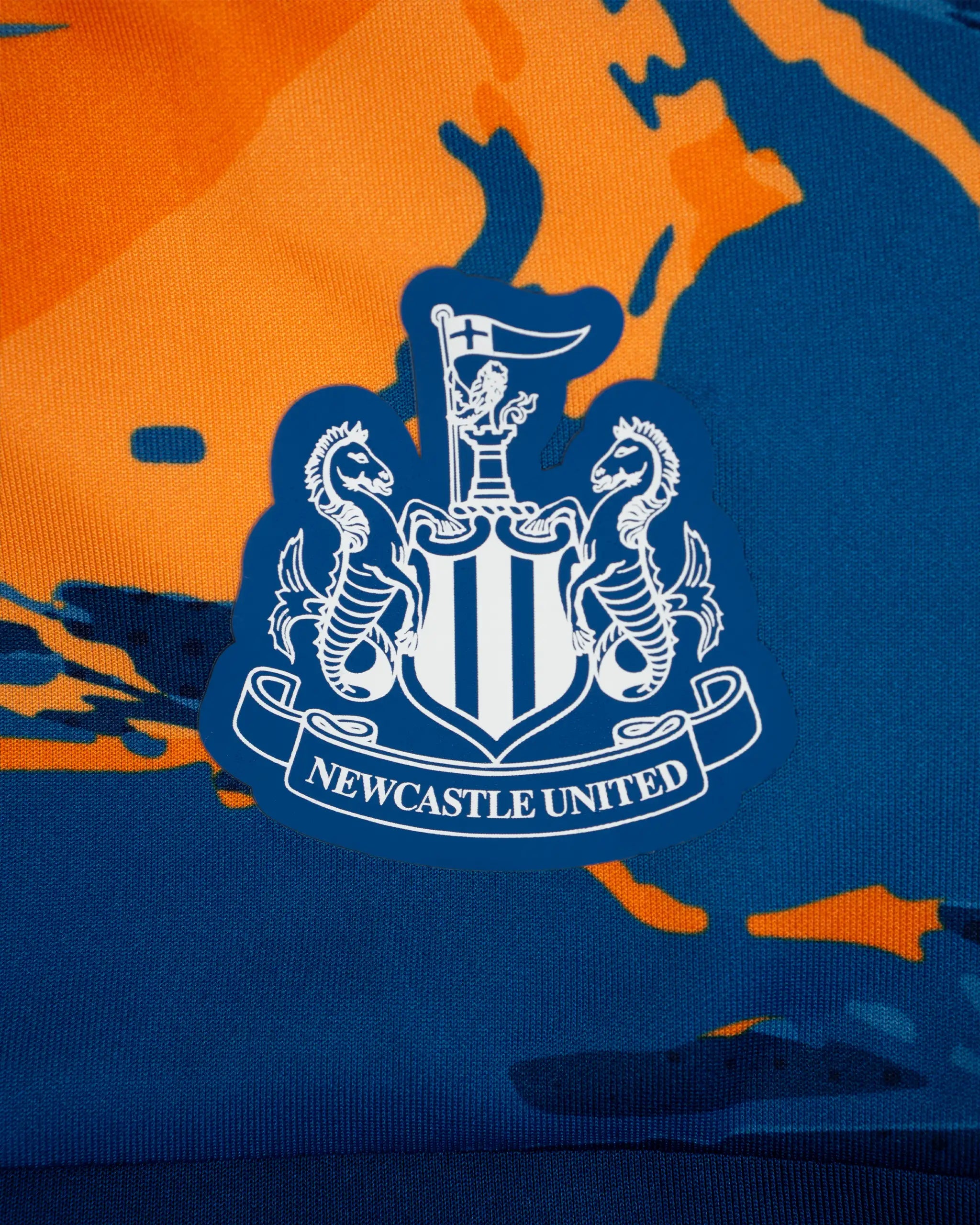 Newcastle United Kids' Navy & Orange Camo Track Jacket