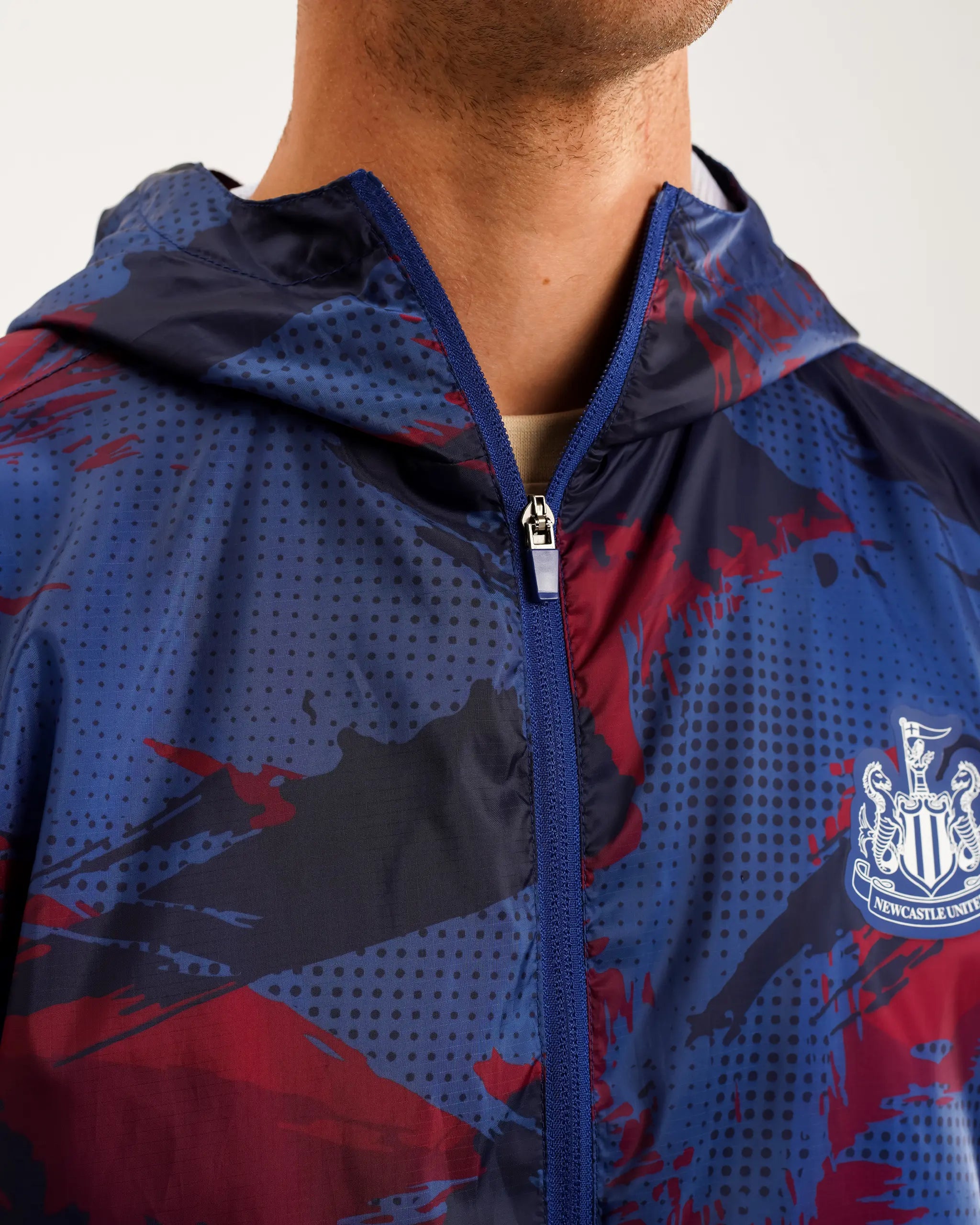 Newcastle United Men's Navy Camo Poly Shower Jacket