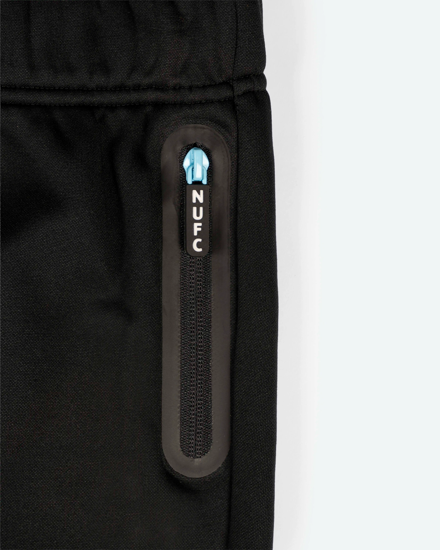 Newcastle United Boy's Black Joggers with Blue Ombre Crest