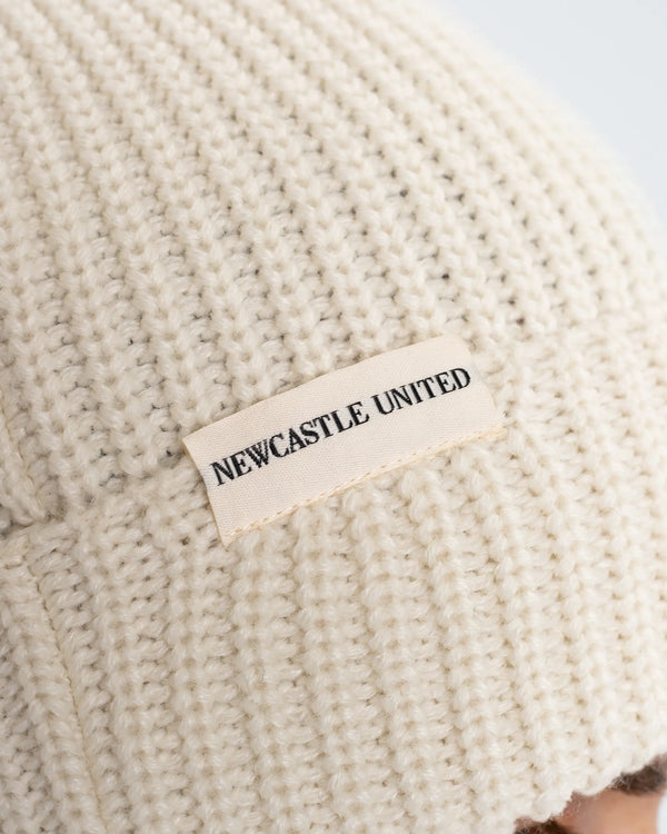 Newcastle United New Era Beige Woven Label Beanie