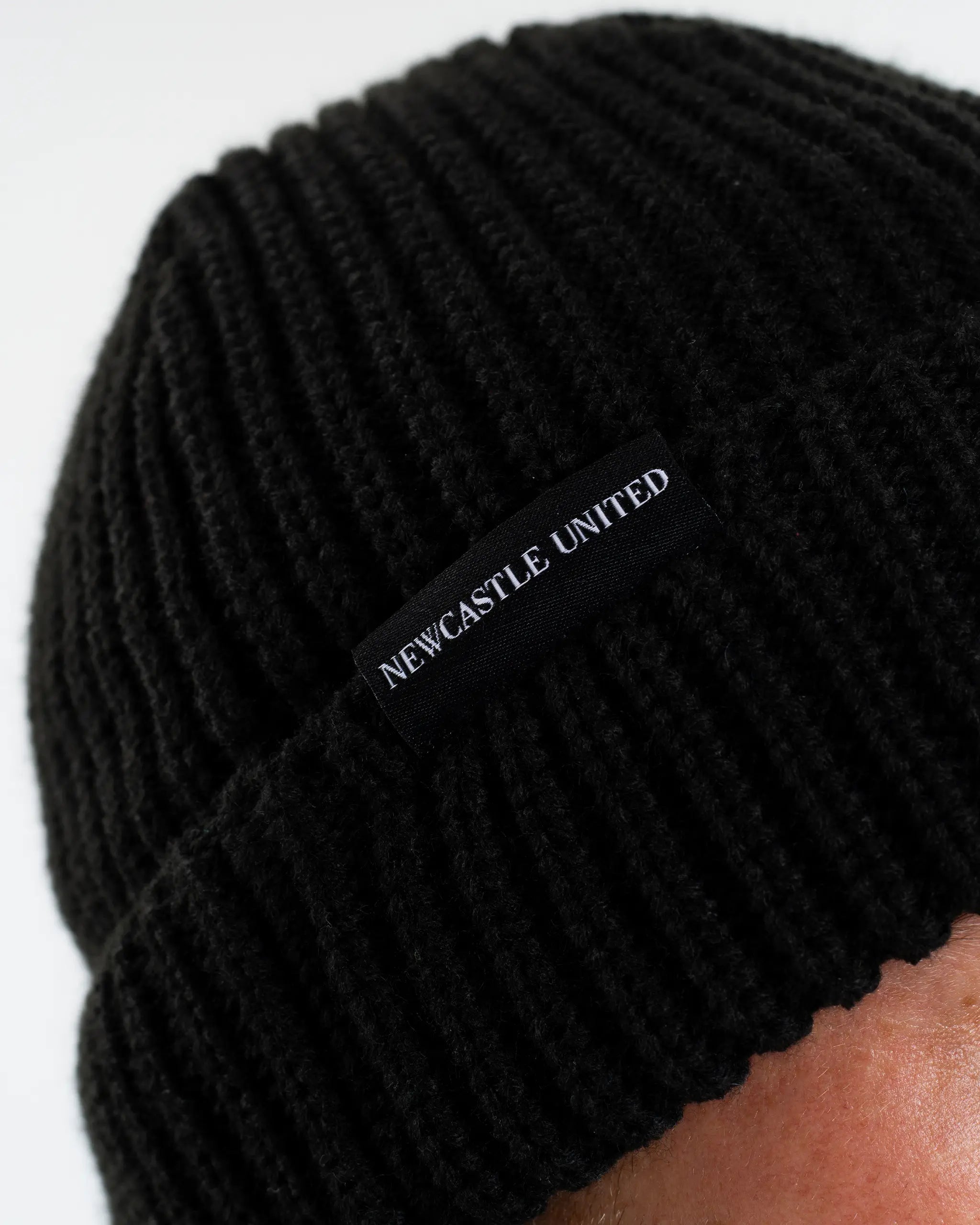 Newcastle United New Era Black Woven Label Beanie