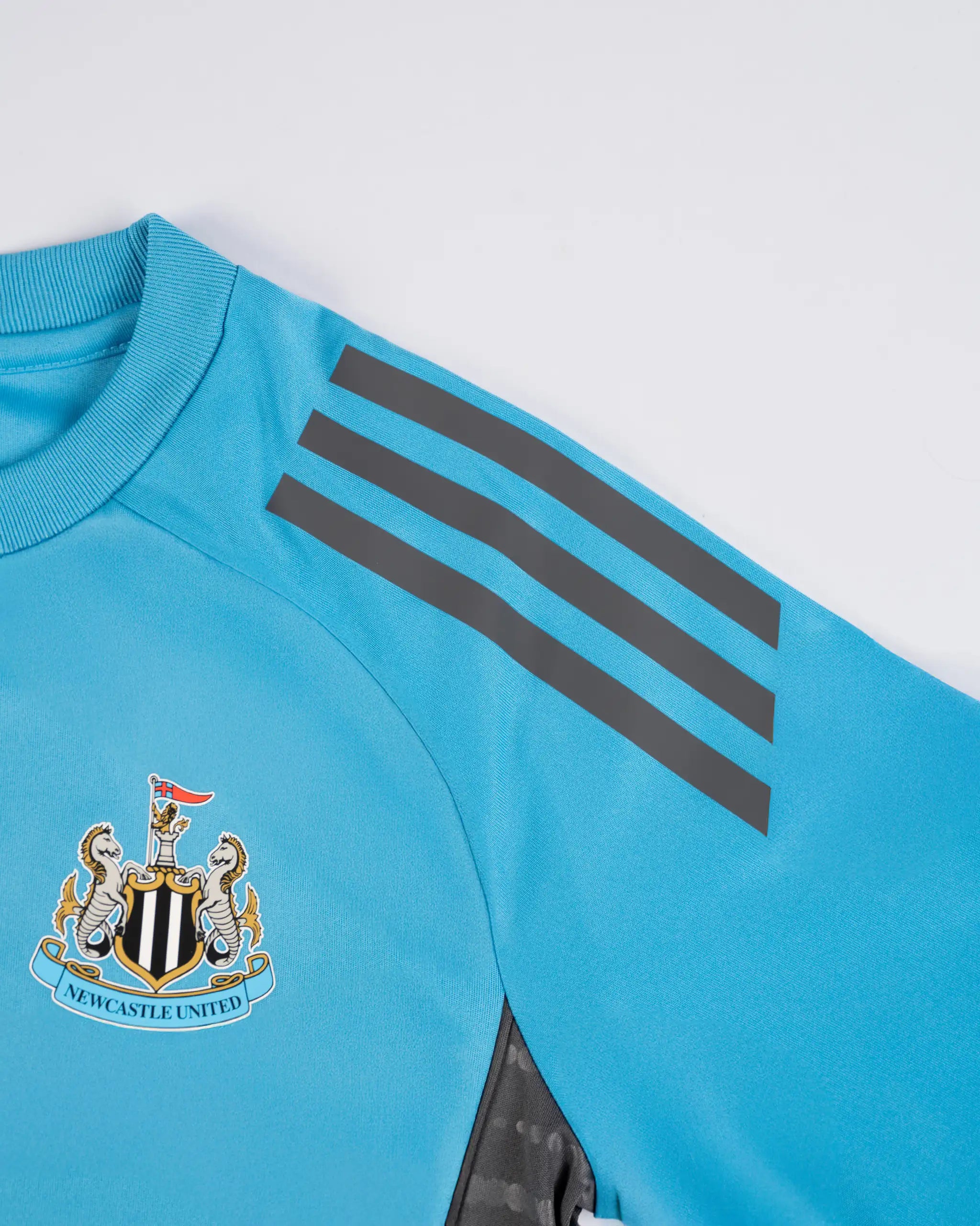 Newcastle United adidas 25/26 Players Range Kids' Blue Shirt