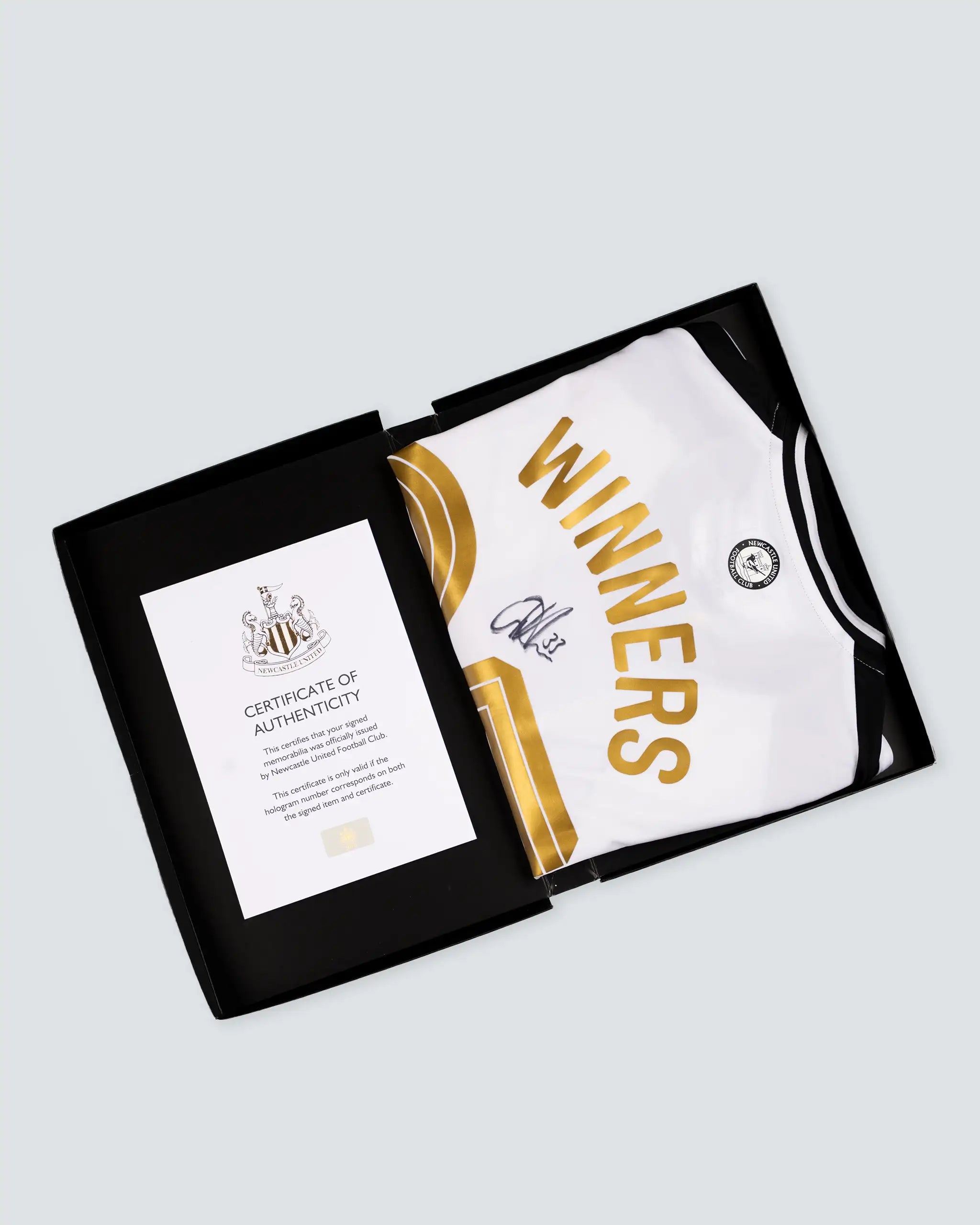 Newcastle United BURN 24/25 Boxed Signed Carabao Cup Winners Shirt