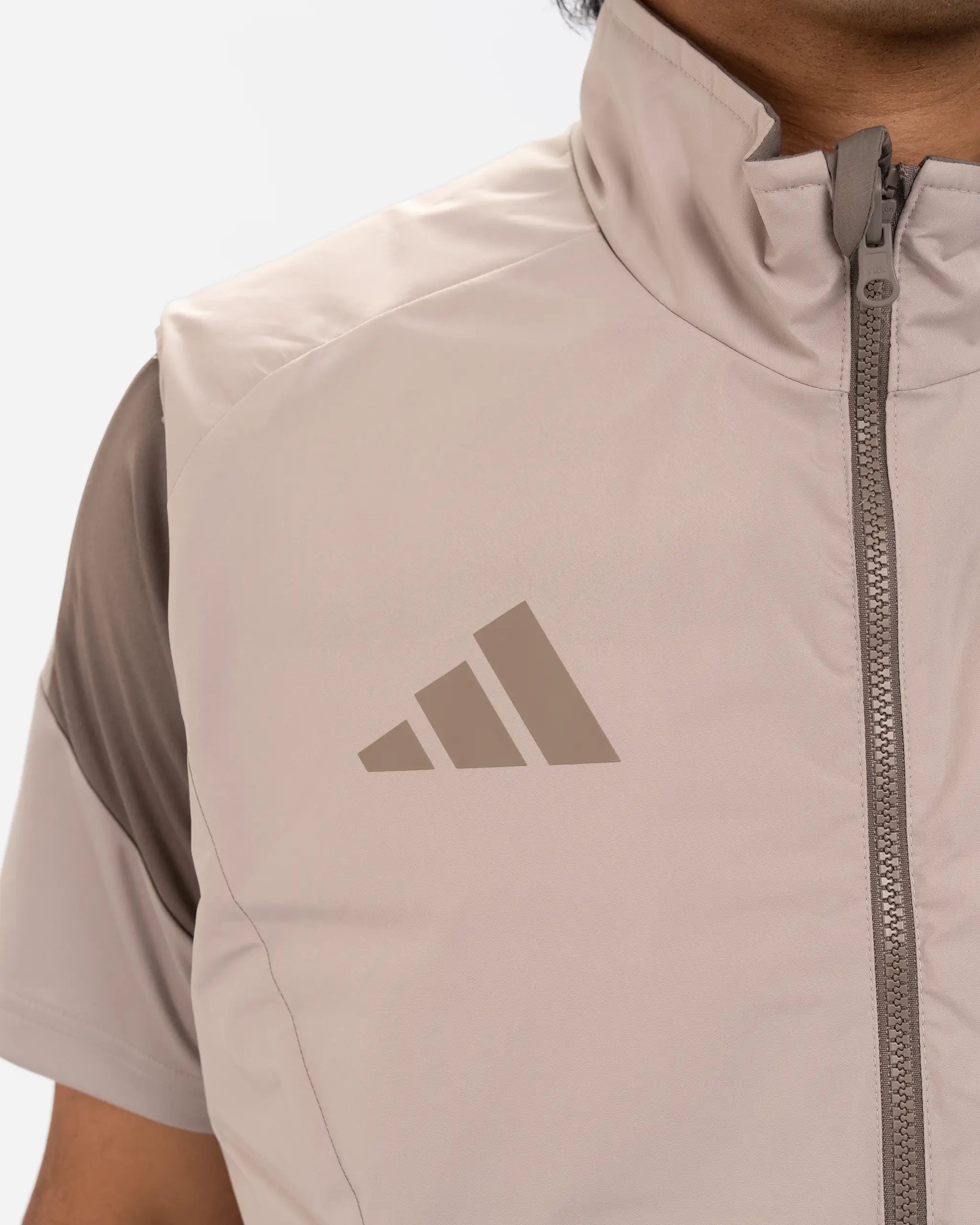 Newcastle United adidas 26/27 Coach's Range Reversible Beige Gilet