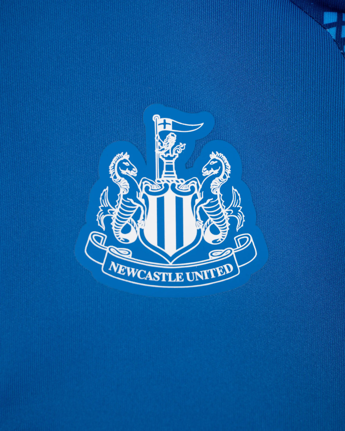Newcastle United Kids' Blue Tech Poly 1/4 Zip Track Top