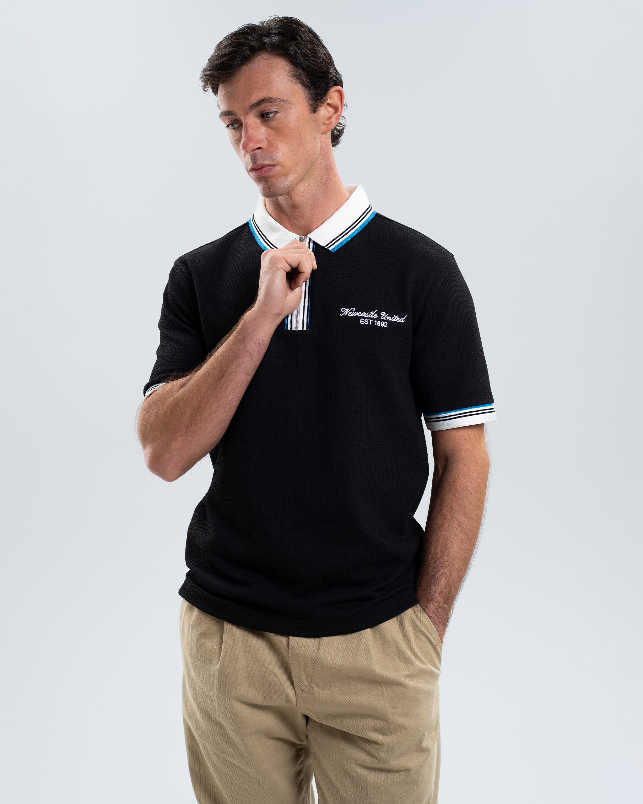Newcastle United Men's Zipped Black Polo Shirt