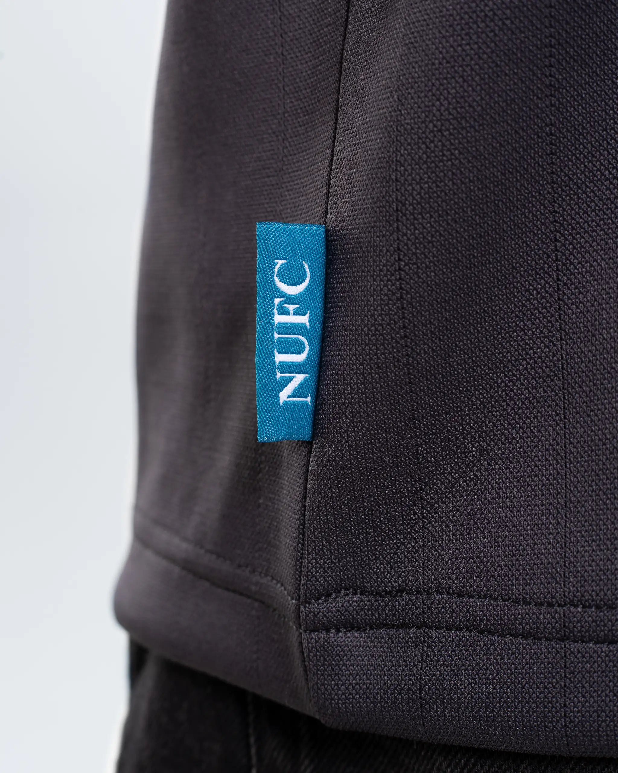 Newcastle United Men's Tonal Stripe Grey Polo Shirt