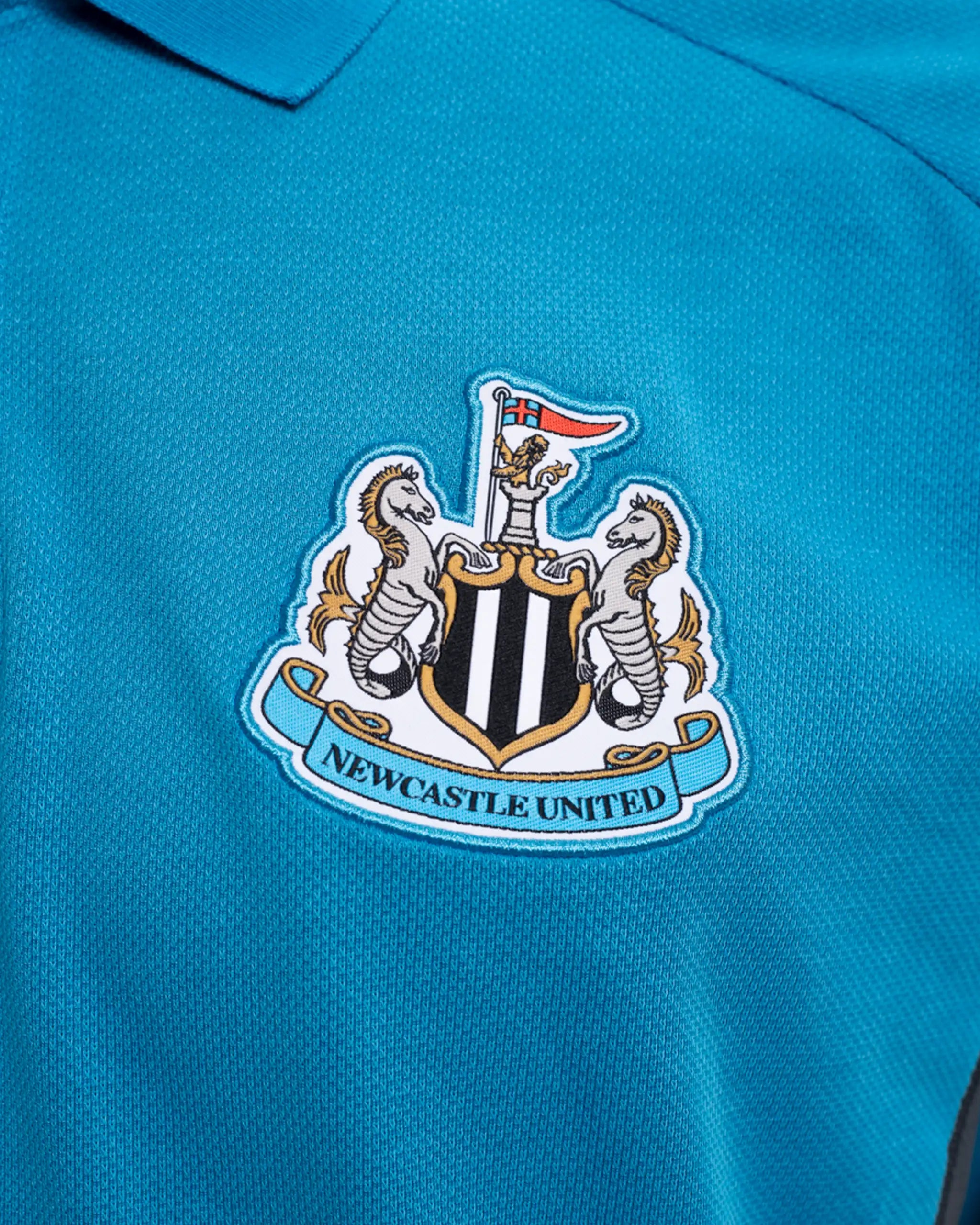 Newcastle United adidas 25/26 Players Range Blue Polo Shirt