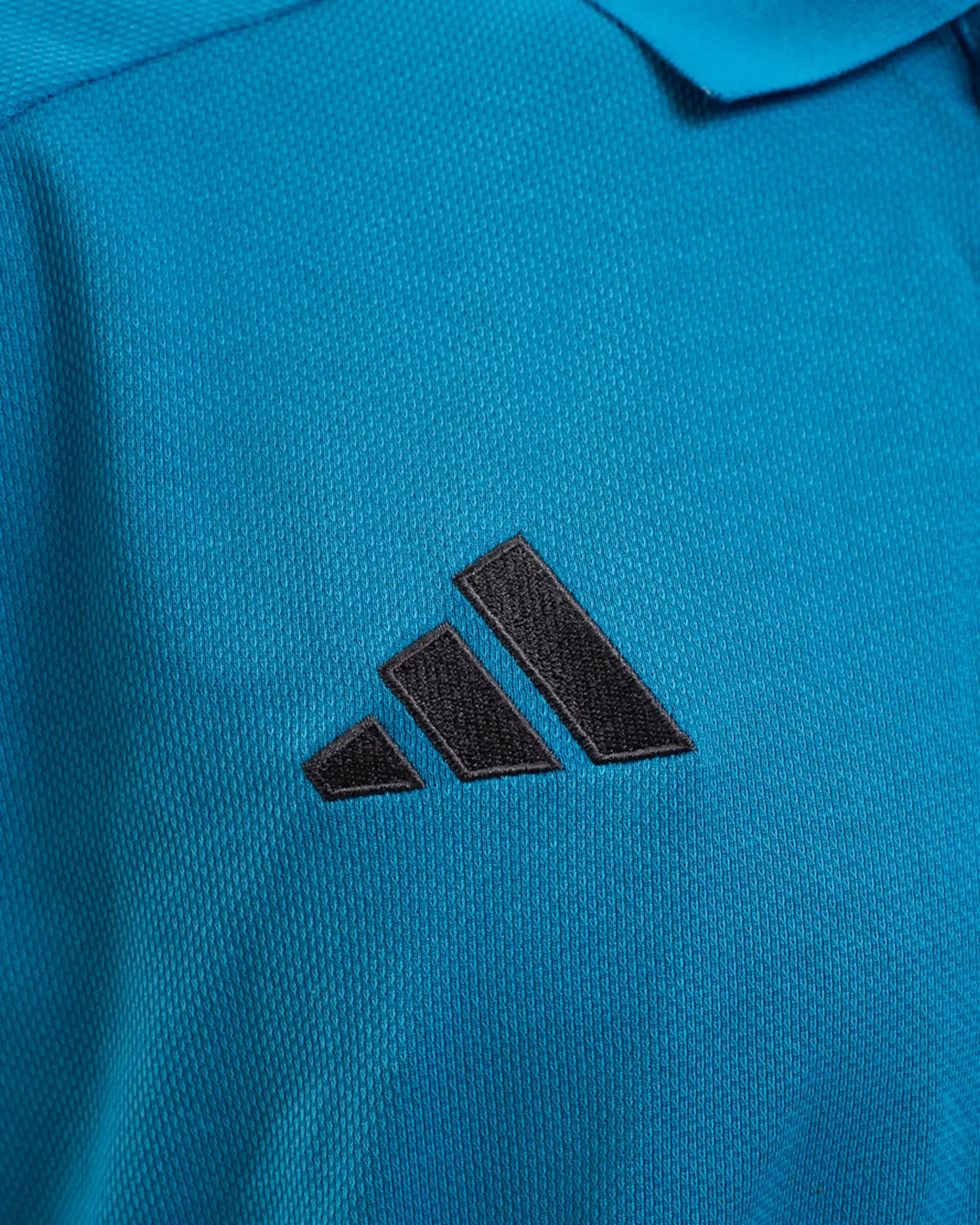 Newcastle United adidas 25/26 Players Range Blue Polo Shirt