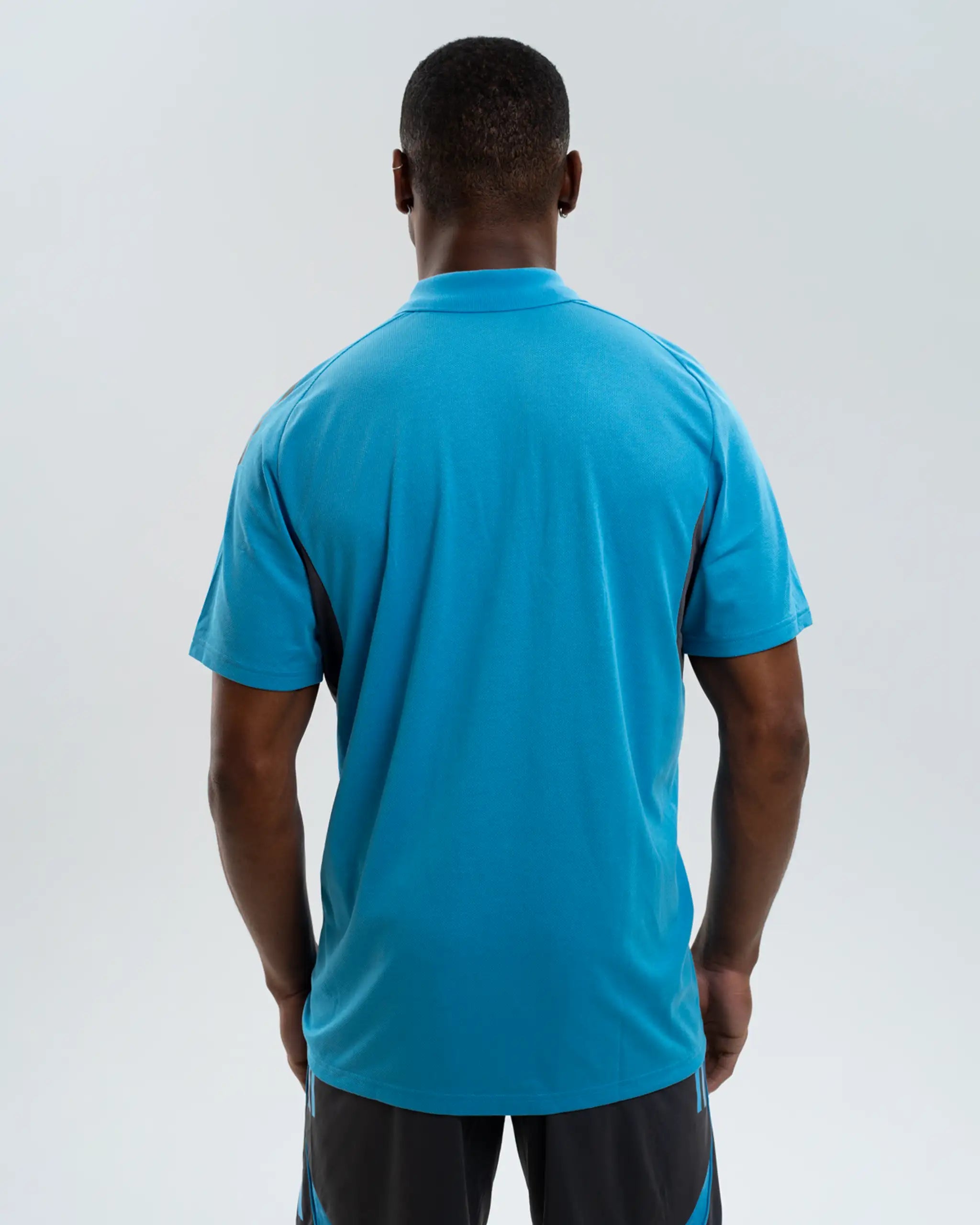 Newcastle United adidas 25/26 Players Range Blue Polo Shirt