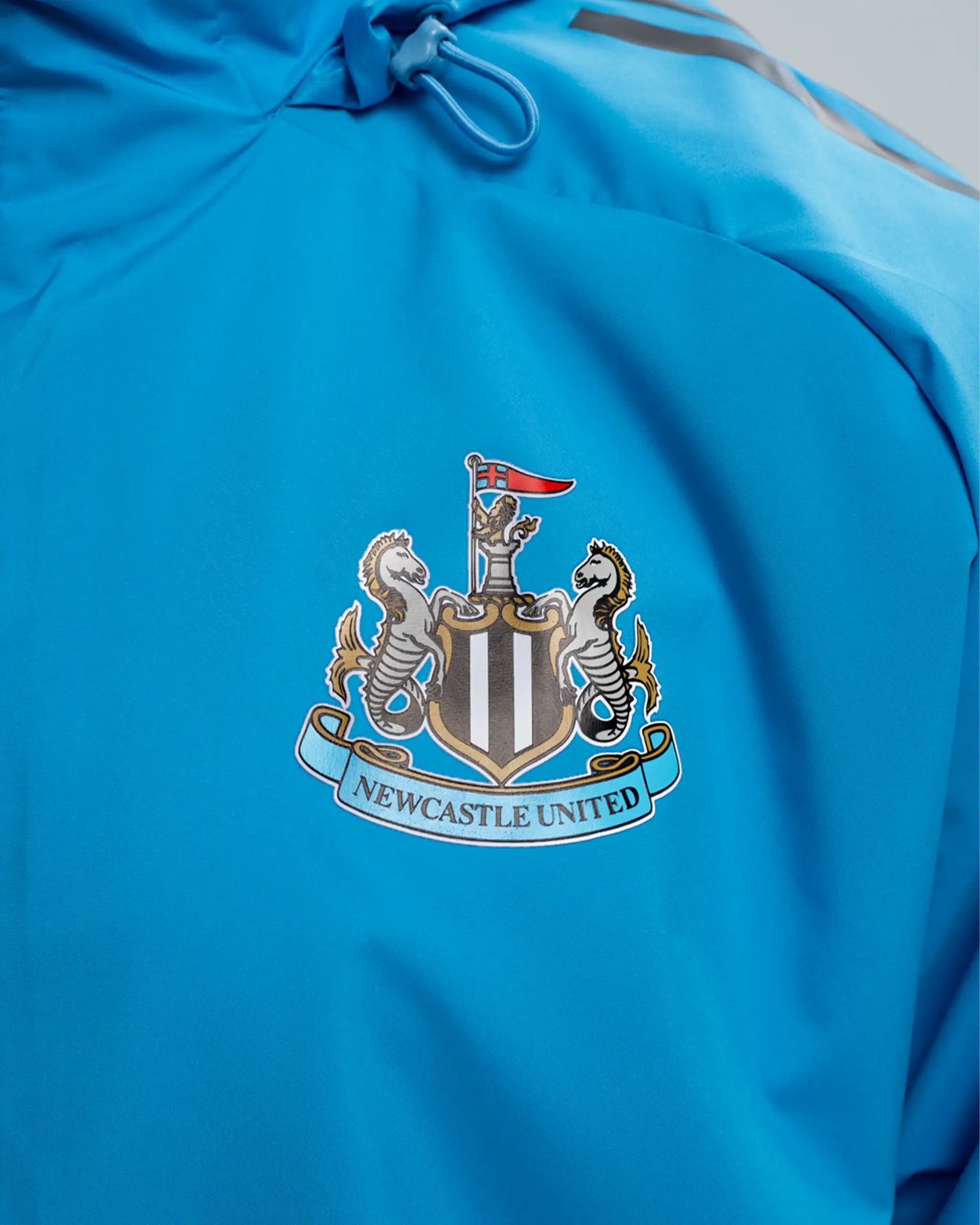 Newcastle United adidas 25/26 Players Range Blue All Weather Jacket