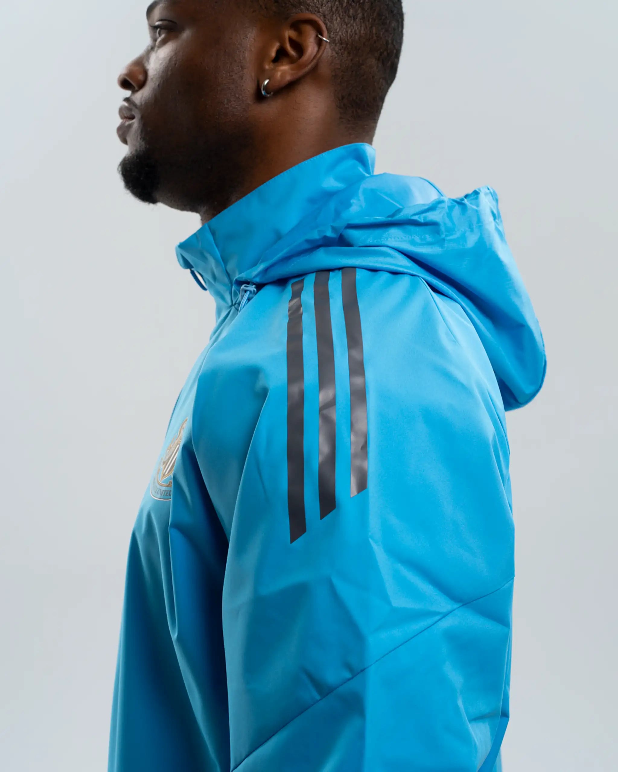Newcastle United adidas 25/26 Players Range Blue All Weather Jacket