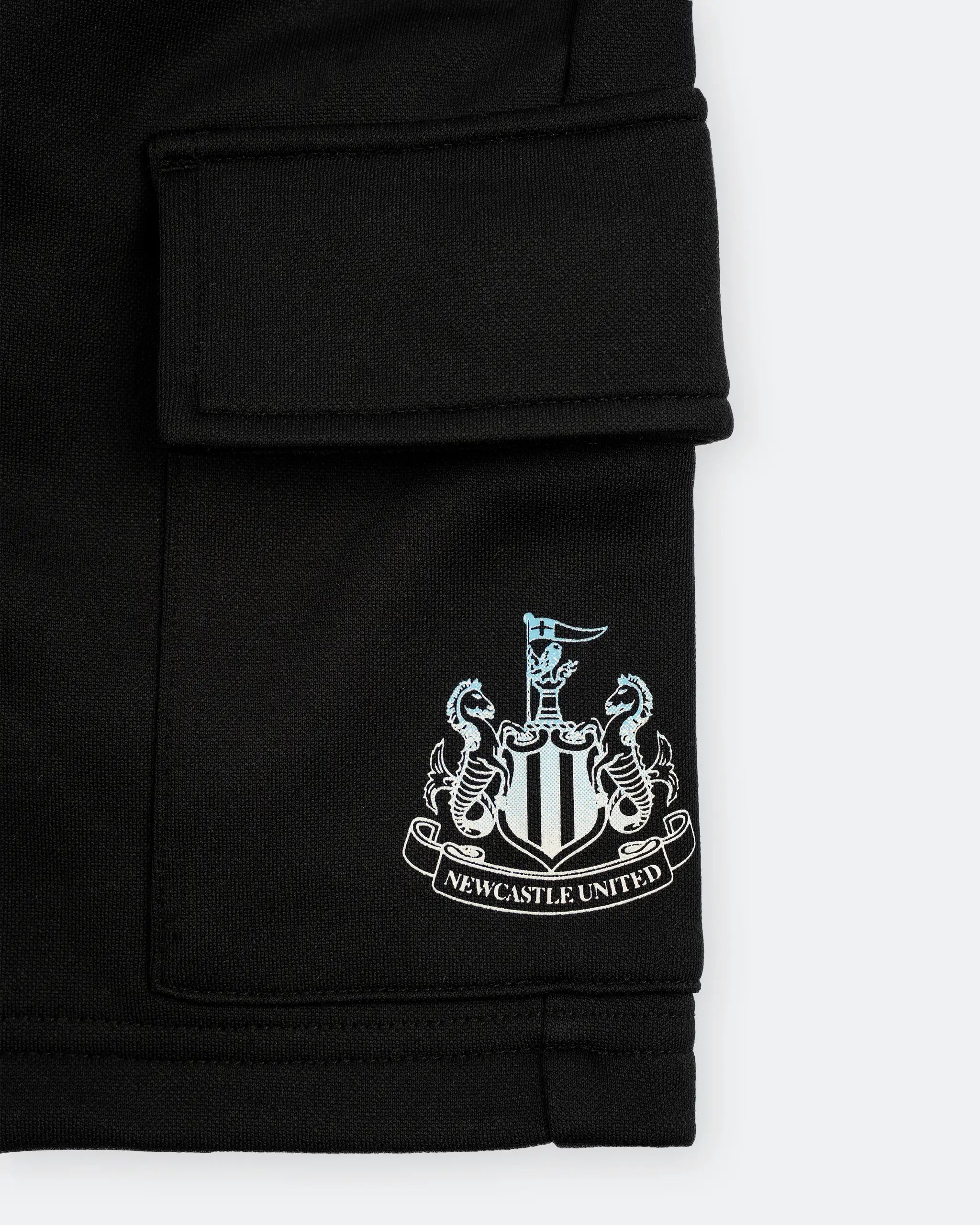 Newcastle United Boy's Black Cargo Shorts with Blue Ombre Crest