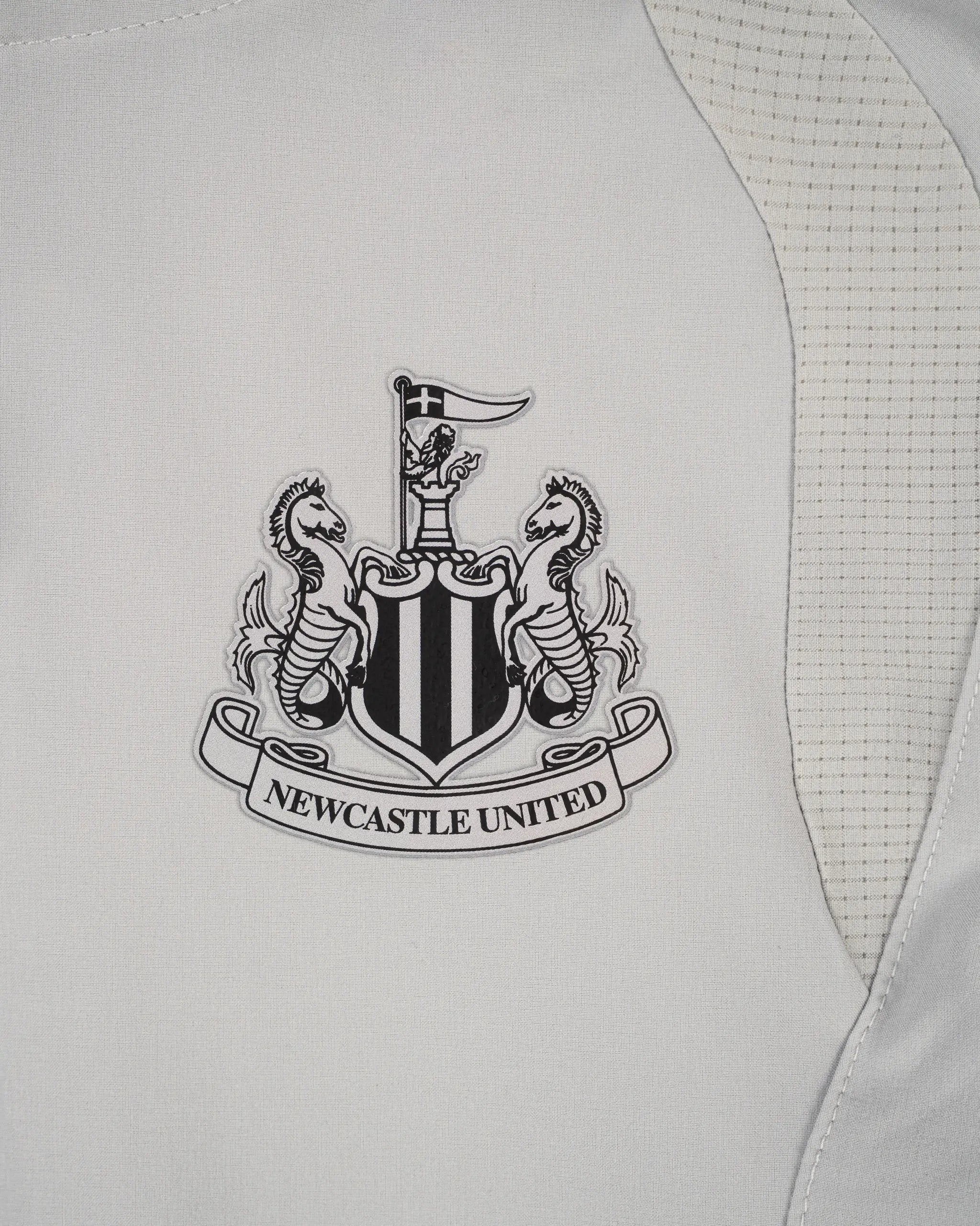 Newcastle United Kids' Alternative Tiro Travel Grey Windbreaker