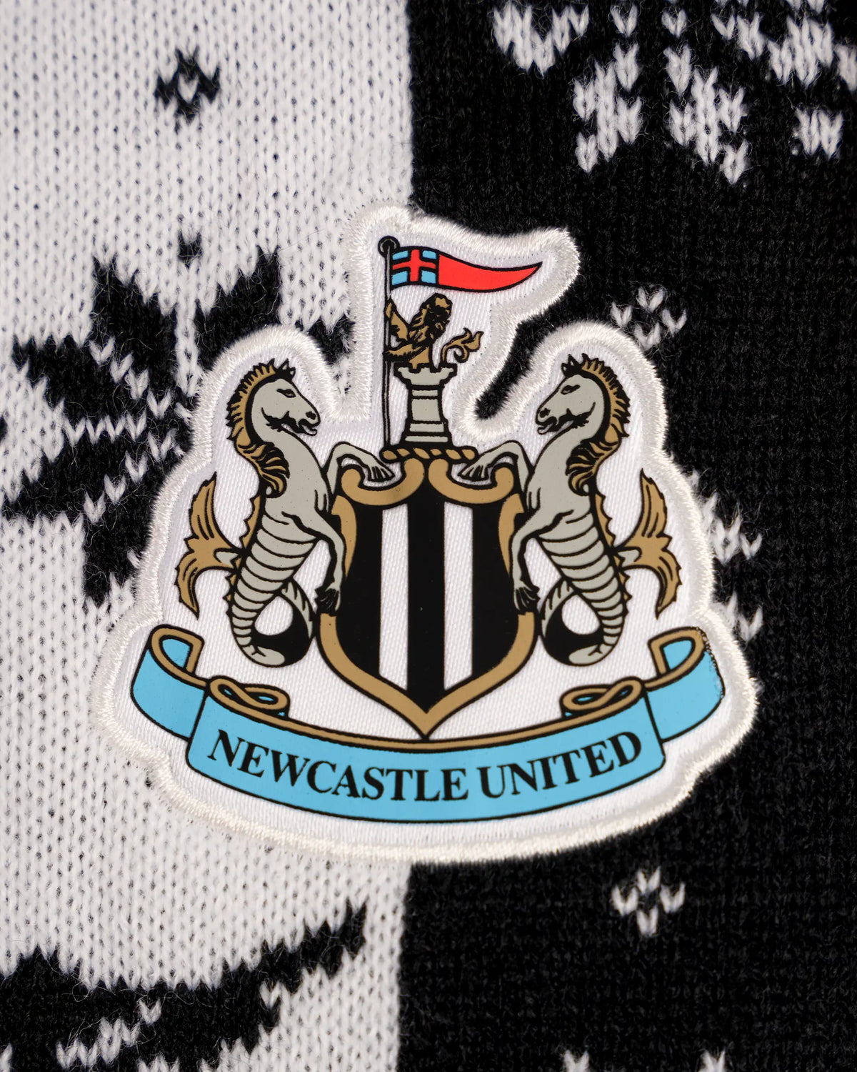 Newcastle United Kids' Black & White Christmas Jumper