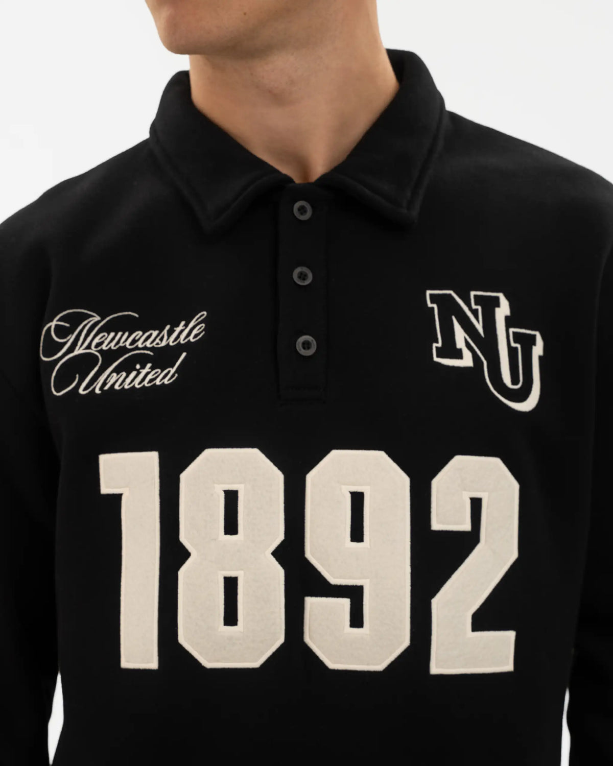 Newcastle United East Coast Varsity Black Polo Sweatshirt