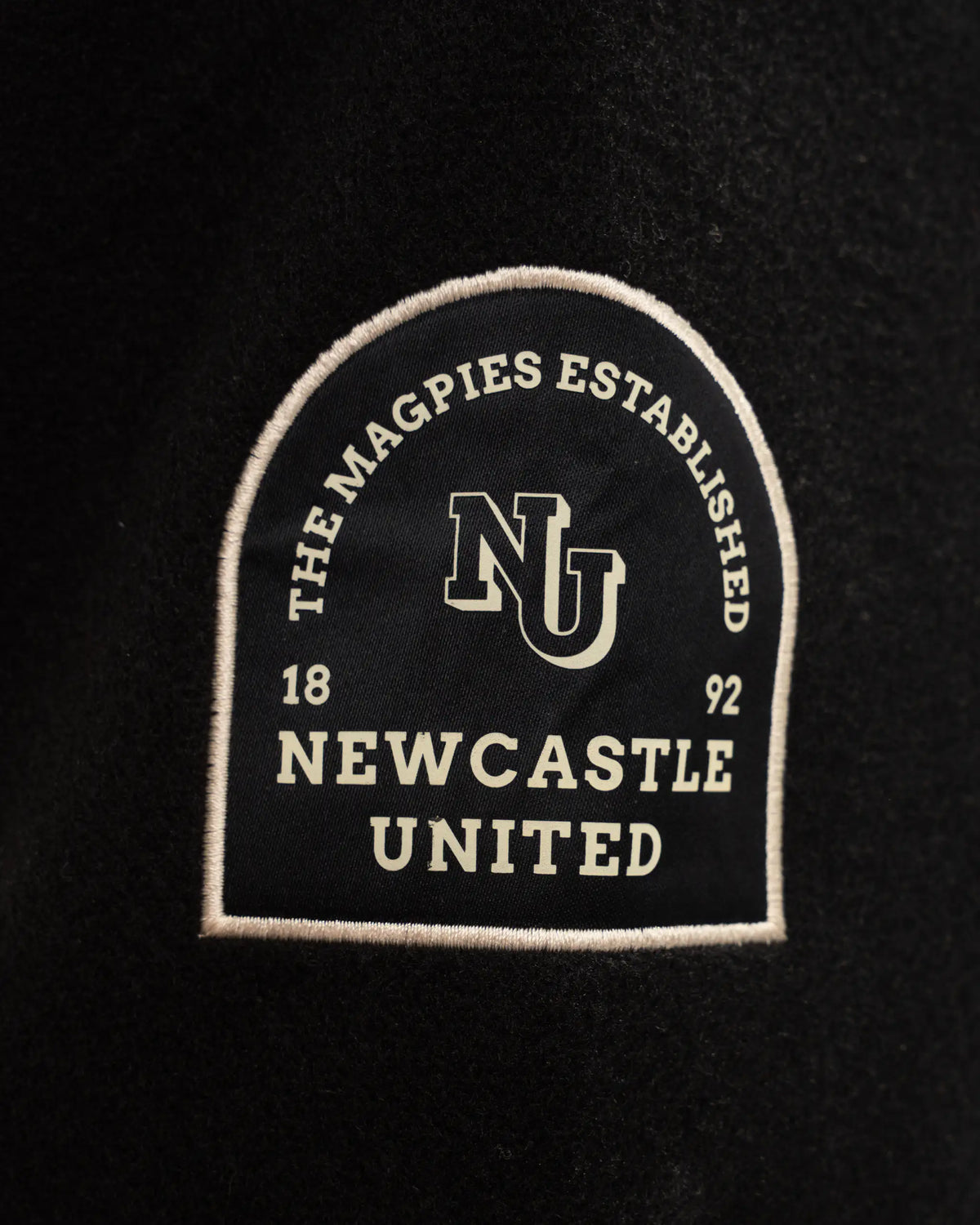 Newcastle United East Coast Varsity Black Bomber Jacket