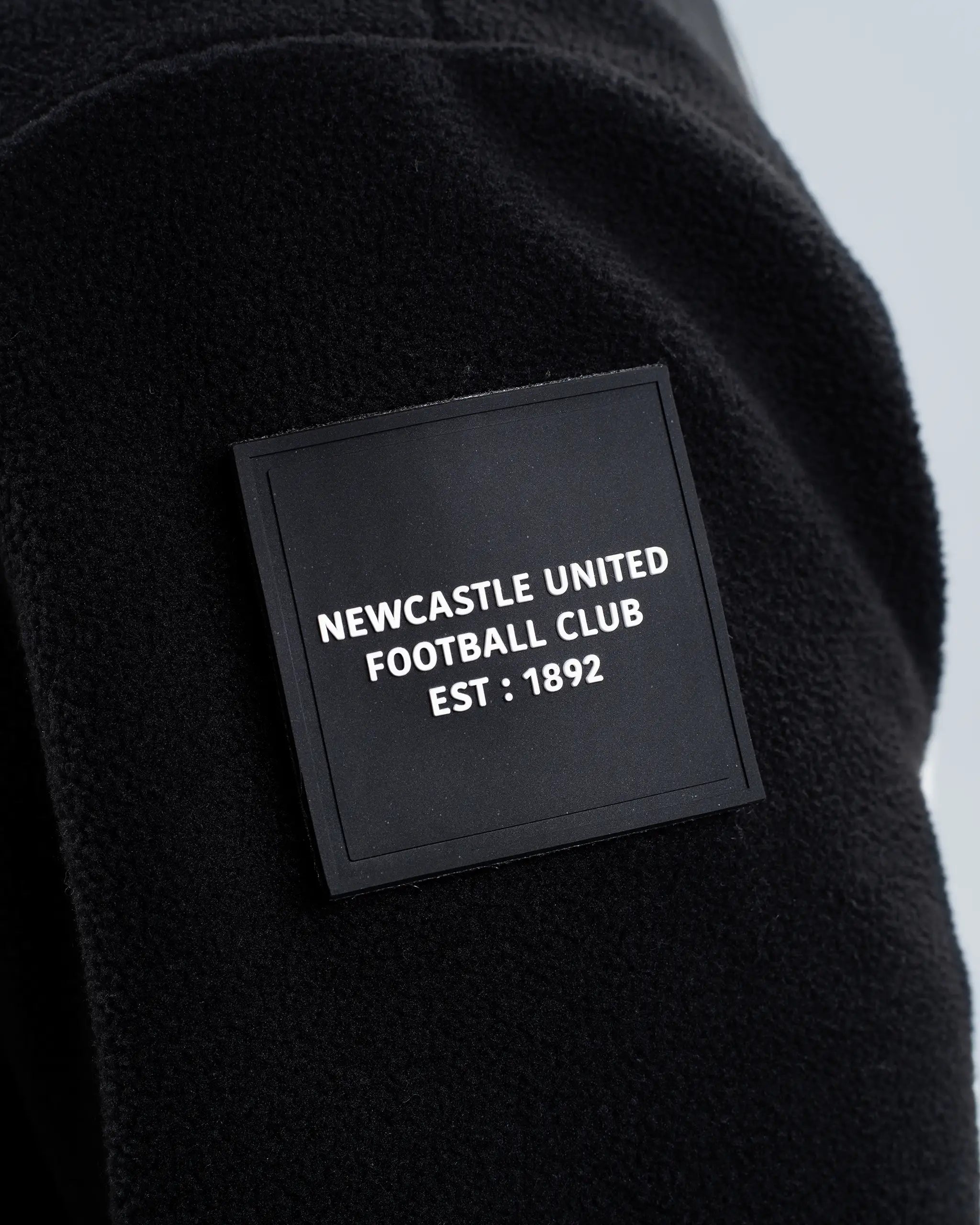 Newcastle United Black Zip Up Fleece Jacket