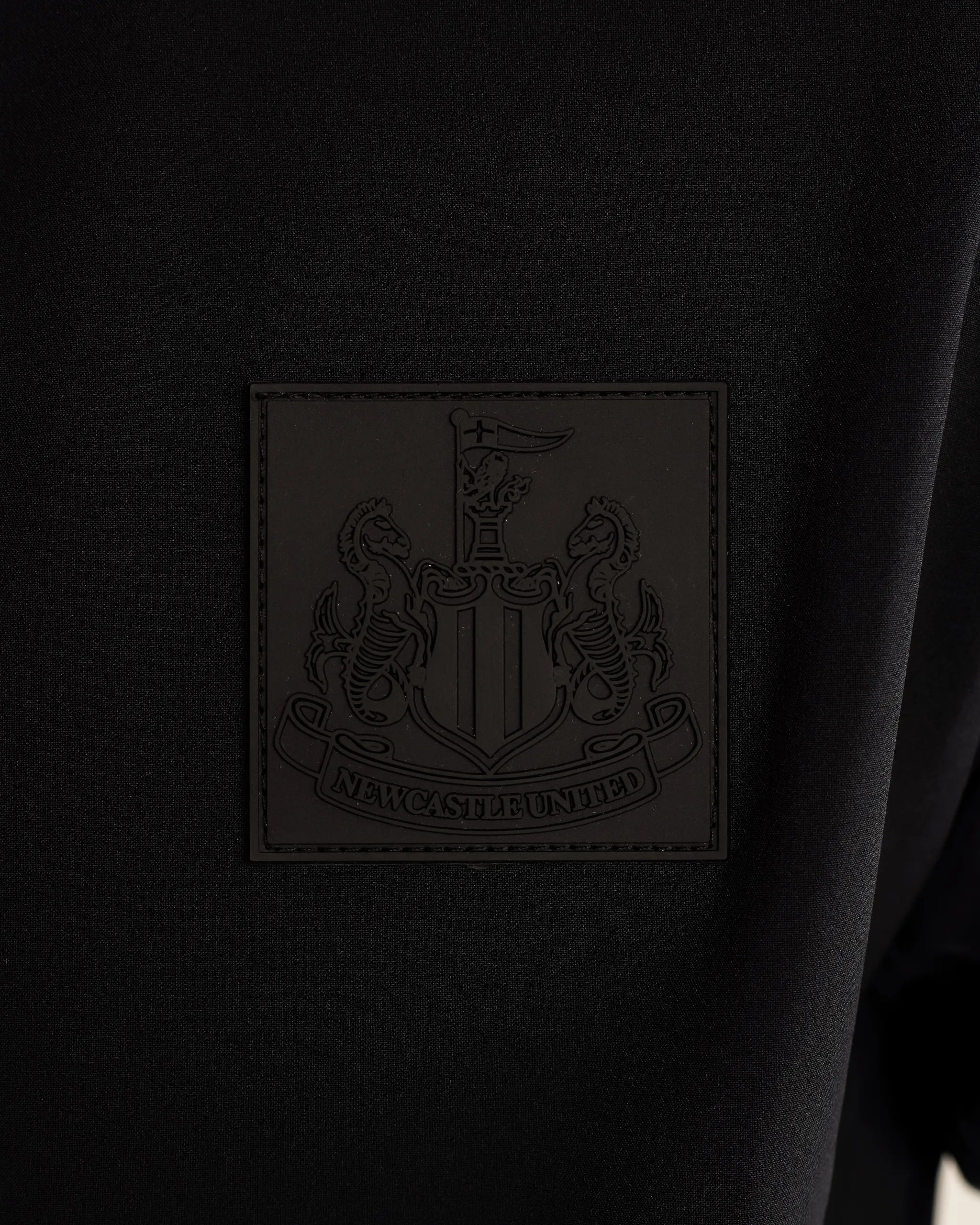 Newcastle United Men's Black Raglan Jacket