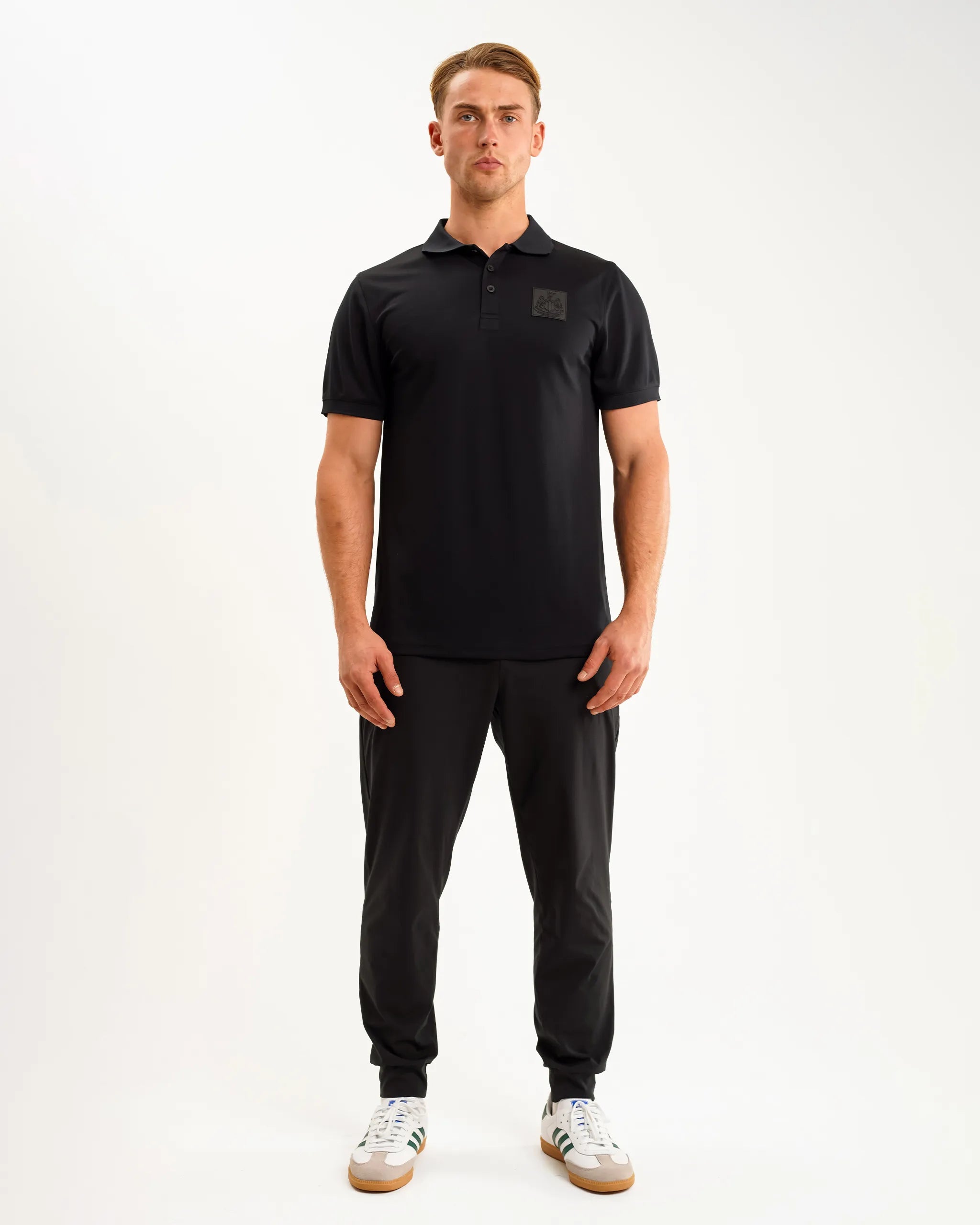 Newcastle United Men's Black Tech Polo Shirt