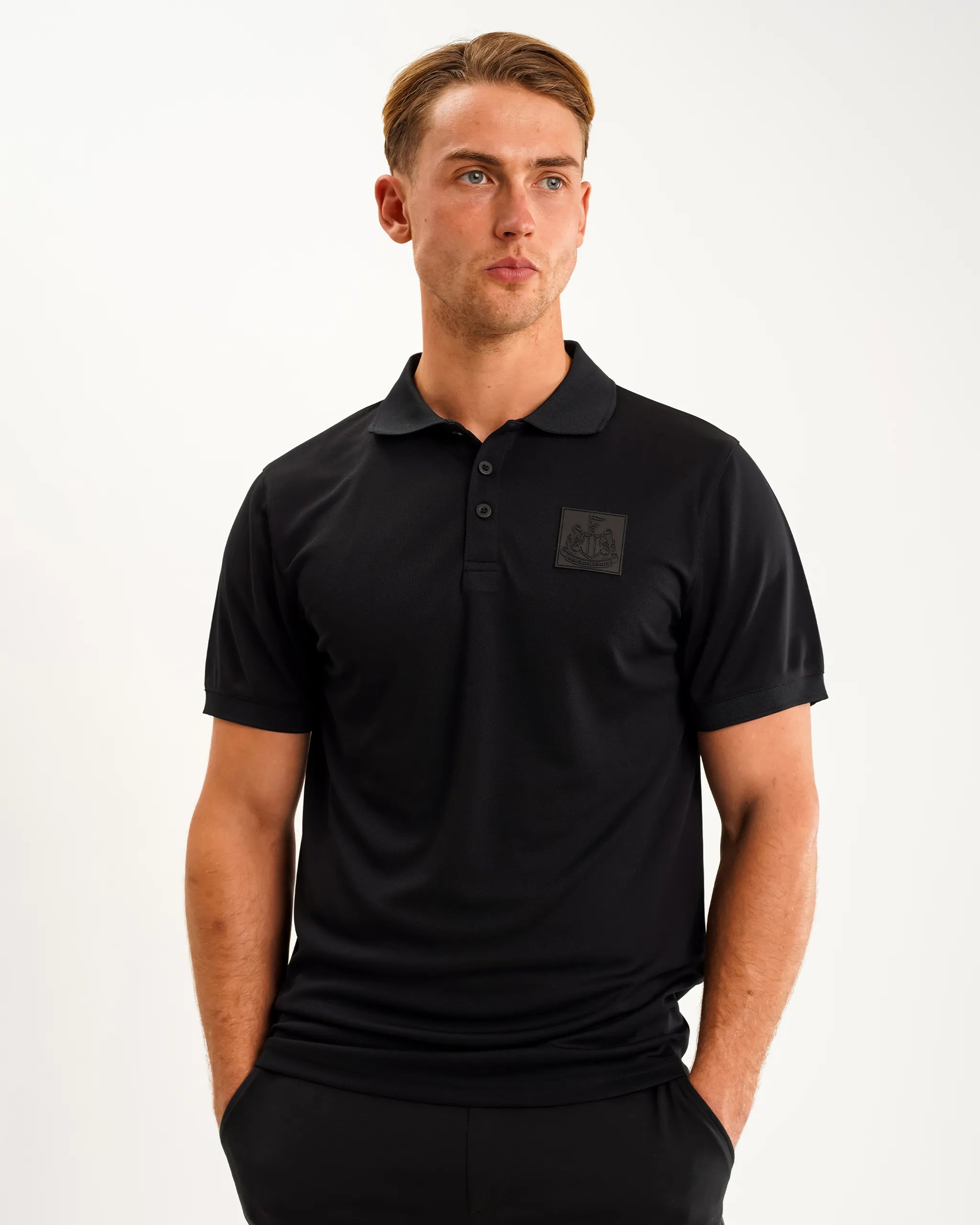 Newcastle United Men's Black Tech Polo Shirt