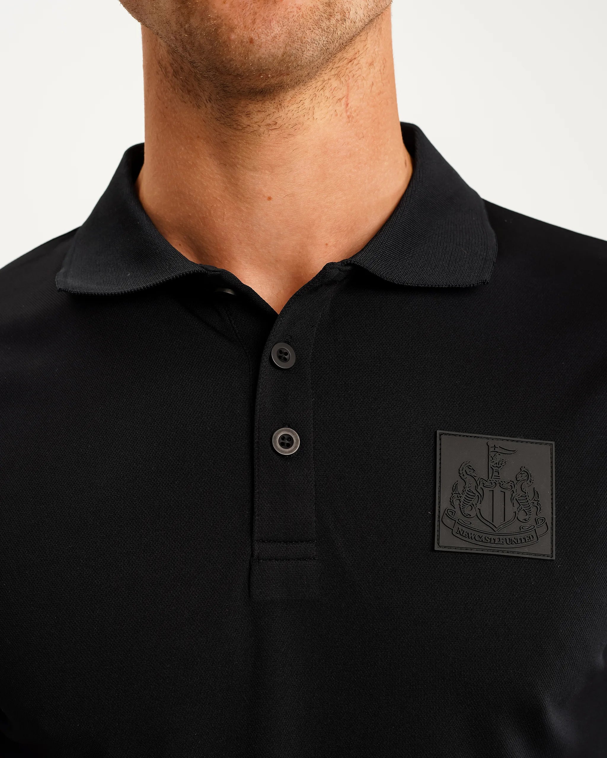 Newcastle United Men's Black Tech Polo Shirt