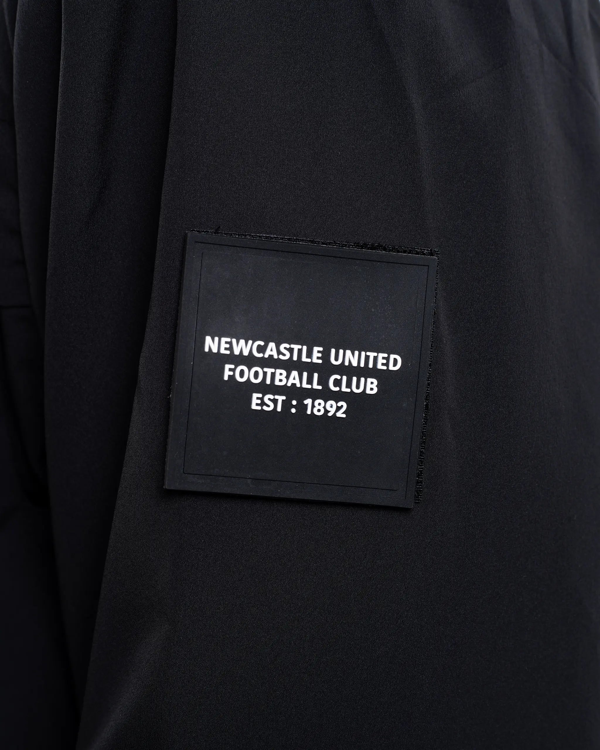 Newcastle United Black Hooded Shower Jacket