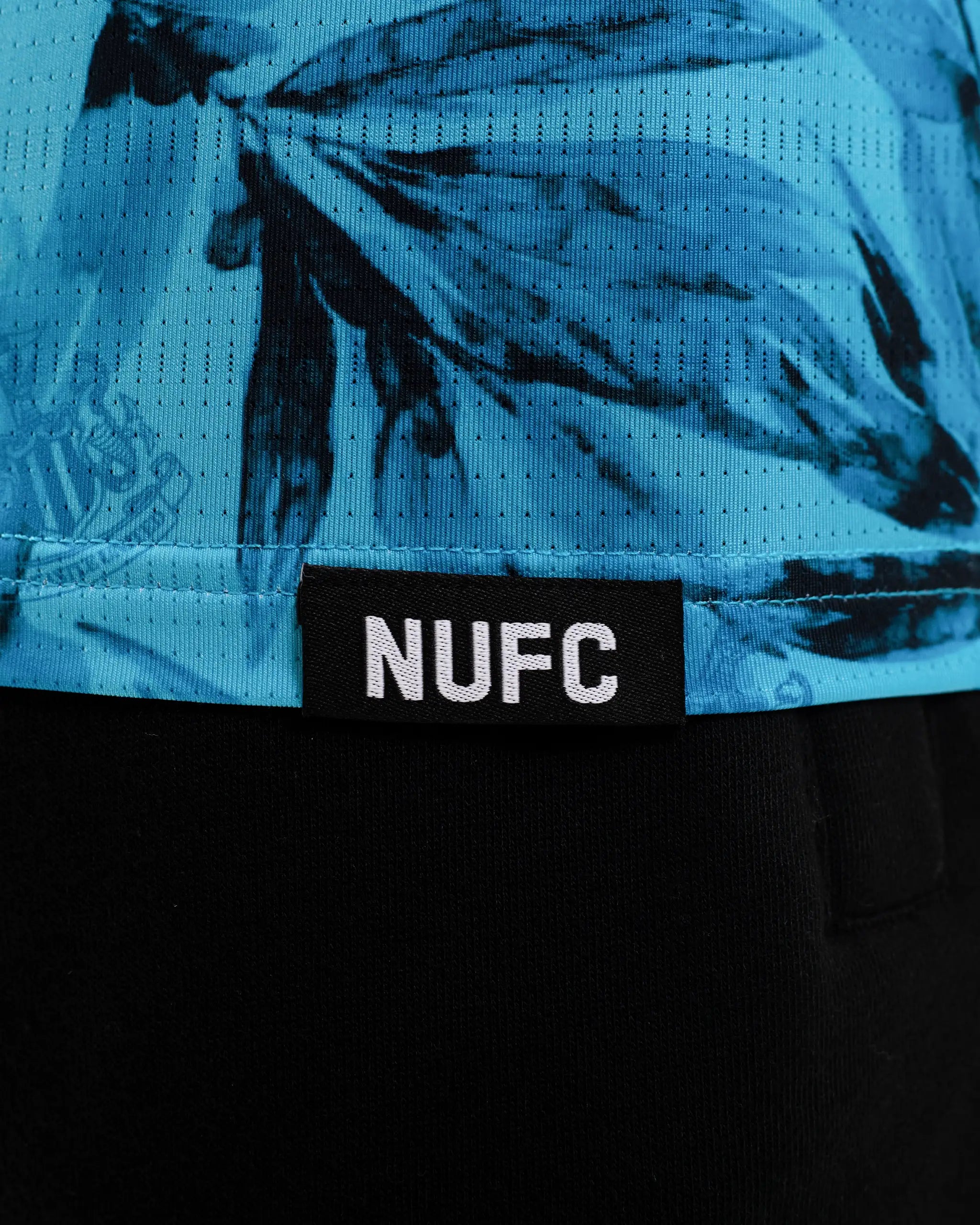 Newcastle United Men's Blue Summer Polo Shirt