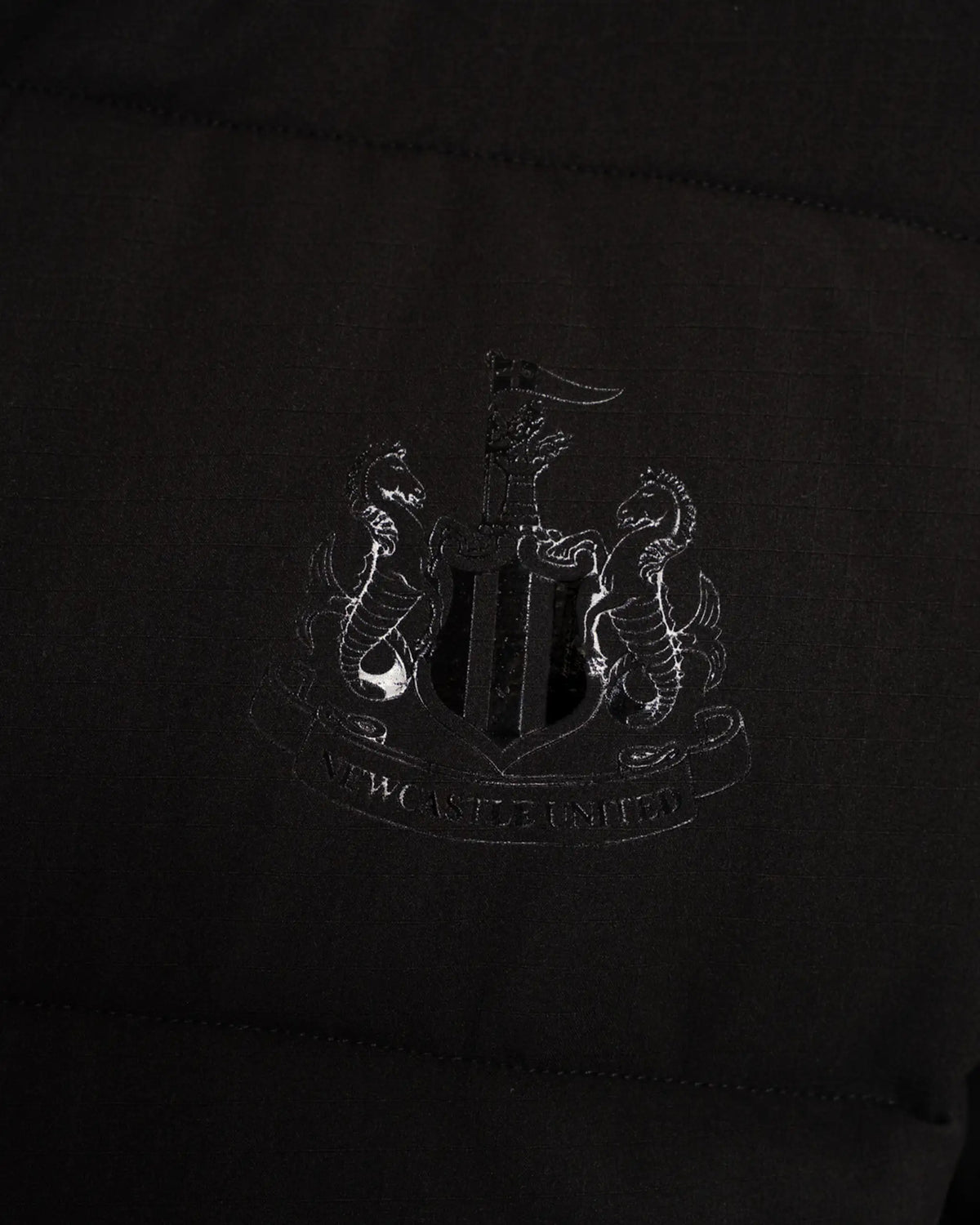 Newcastle United Men's Black Longline Puffer Jacket