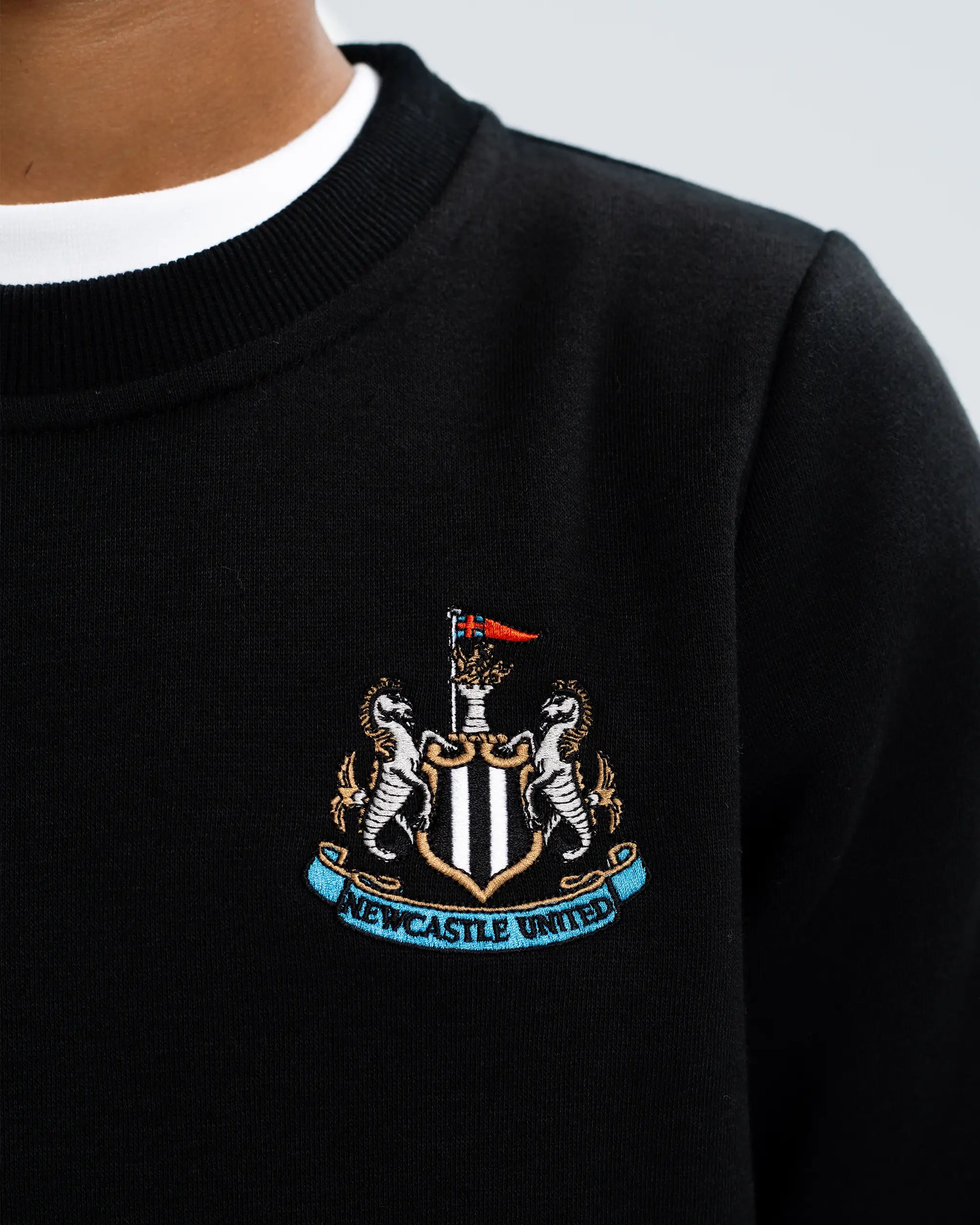 Newcastle United Kids' Essentials Range Black Crew Neck Sweater