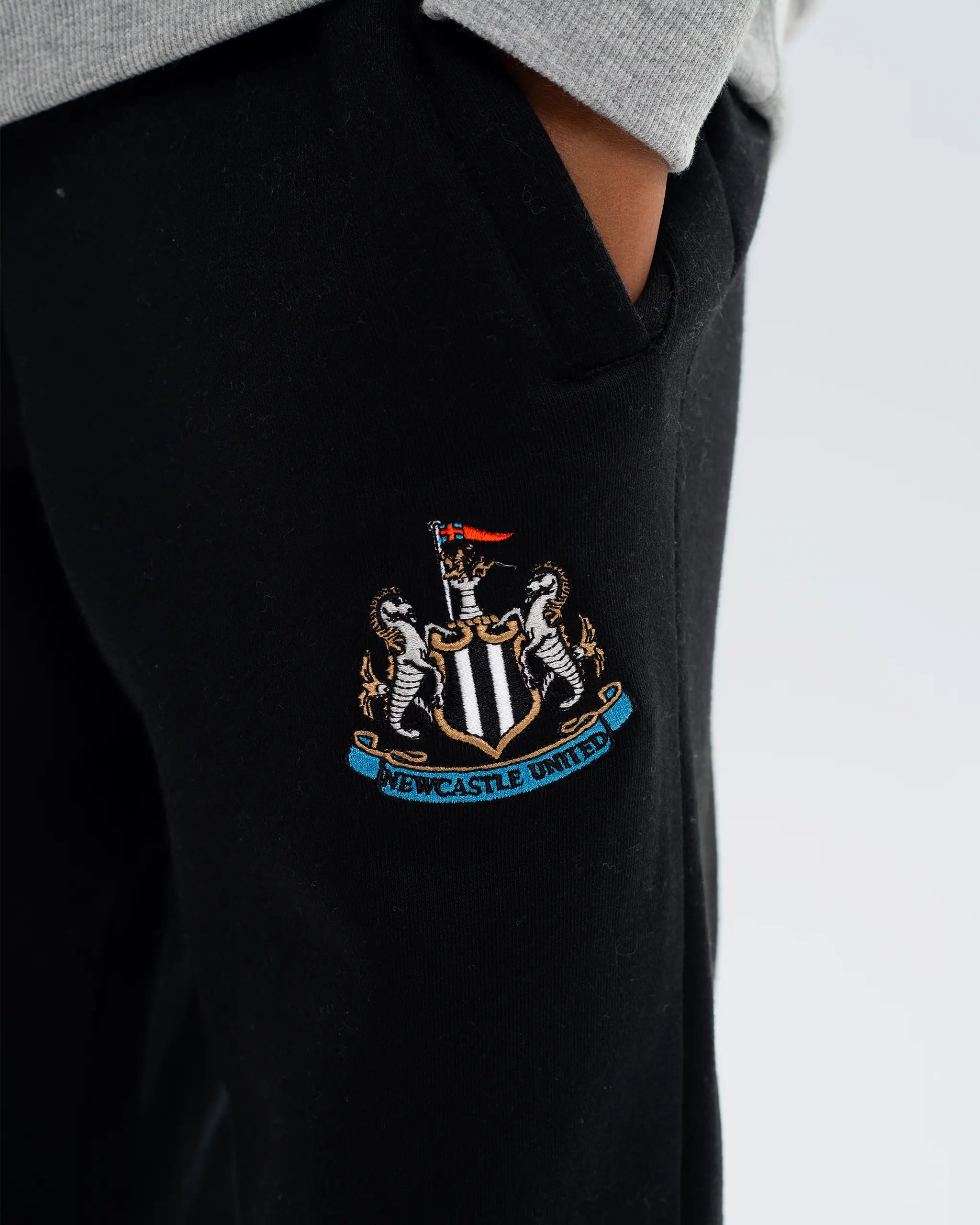 Newcastle United Kids' Essentials Range Black Fleece Jogger Bottoms
