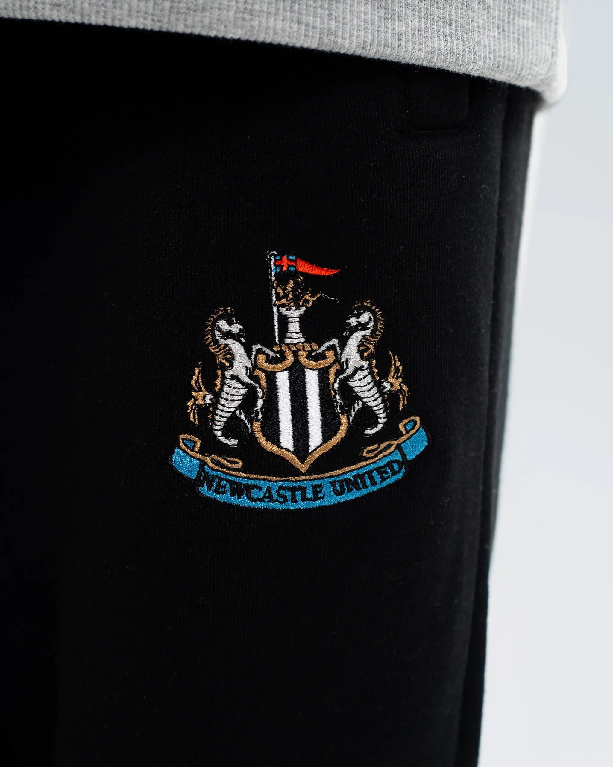 Newcastle United Kids' Essentials Range Black Fleece Jogger Bottoms