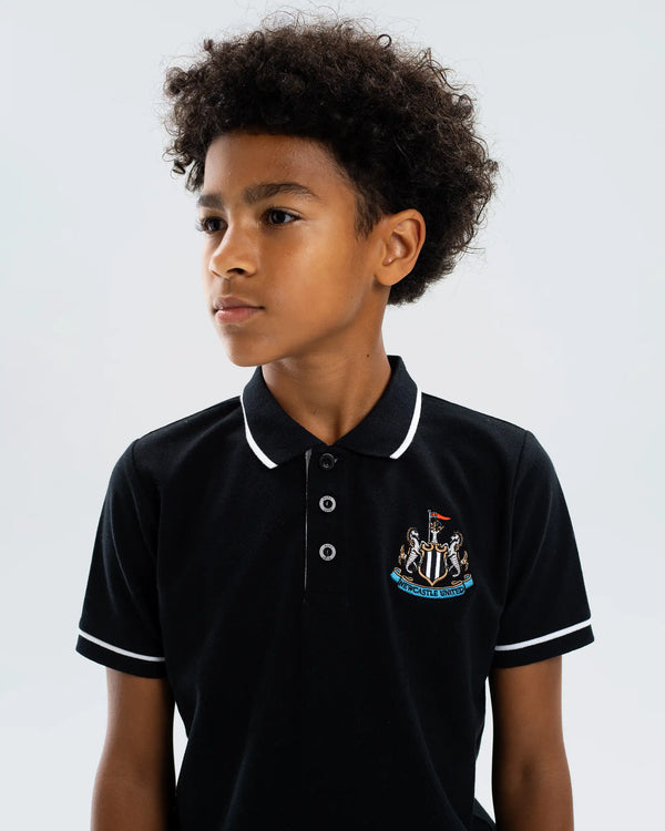 Newcastle United Kids' Essentials Range Black Polo Shirt