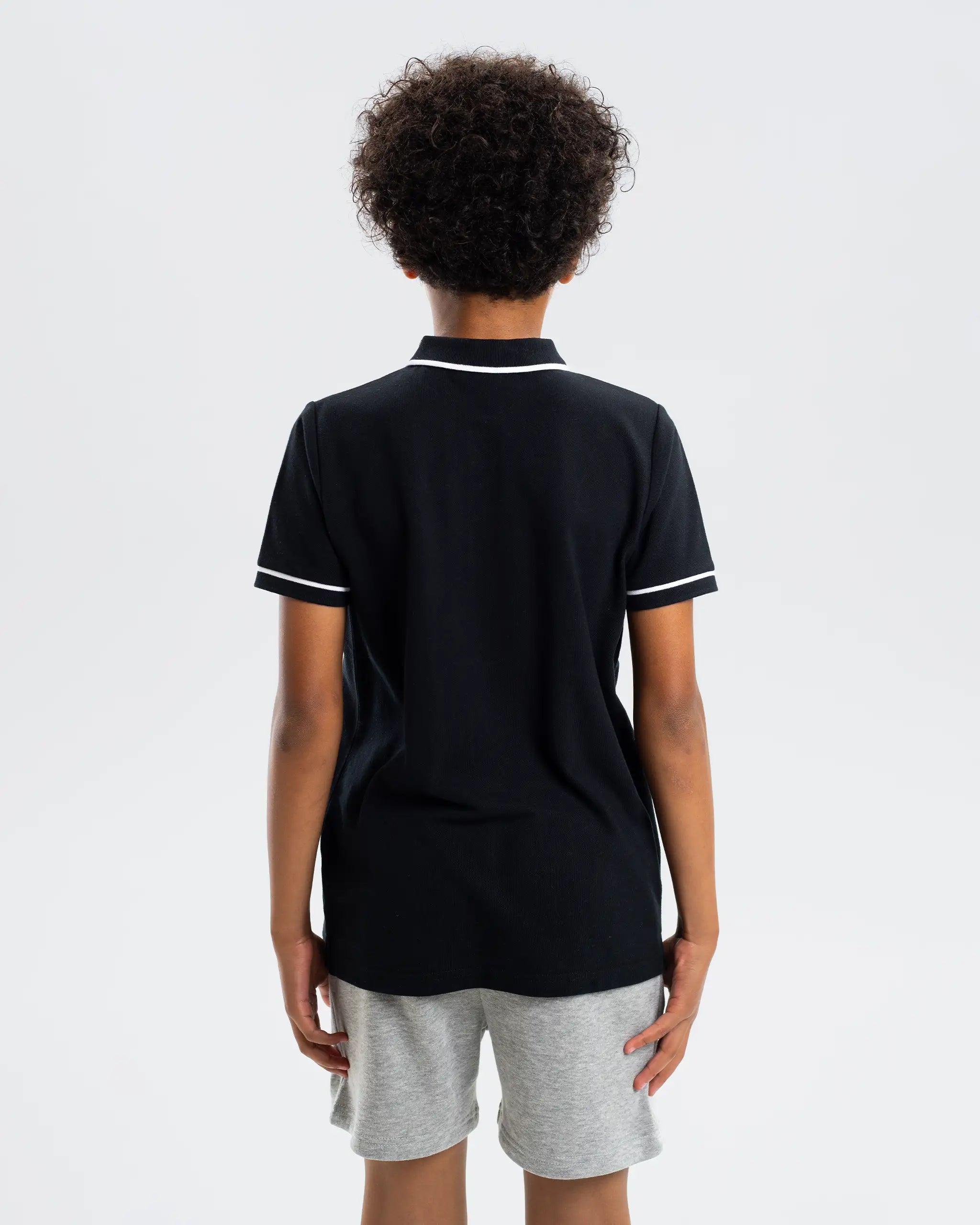 Newcastle United Kids' Essentials Range Black Polo Shirt