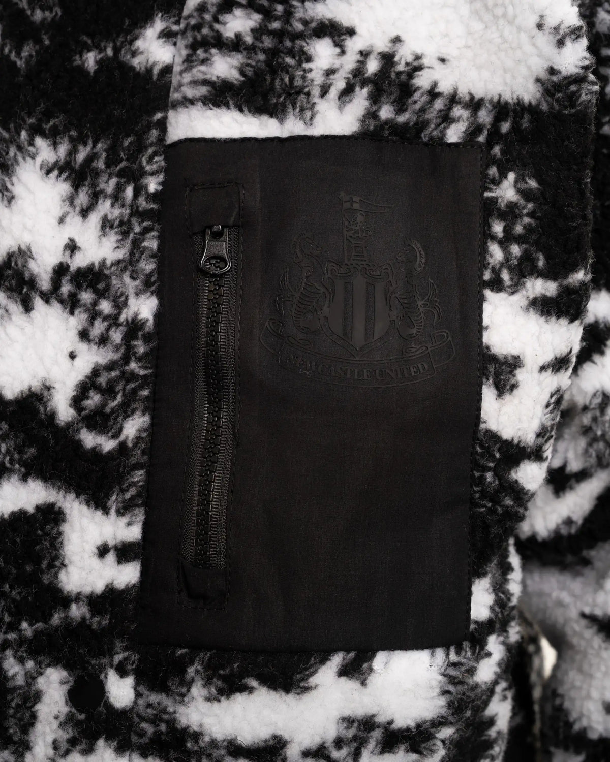Newcastle United Men's Black & White Pocket Teddy Printed Fleece Jacket